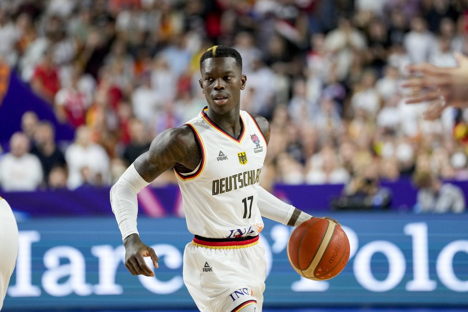 COLOGNE, GERMANY - SEPTEMBER 03: Dennis Schroeder of Germany controls the ball during the FIBA EuroBasket 2022 group B match between Germany and Bosnia and Herzegovina at Lanxess Arena on September 3, 2022 in Cologne, Germany. (Photo by Alex Gottschalk/DeFodi Images via Getty Images)
