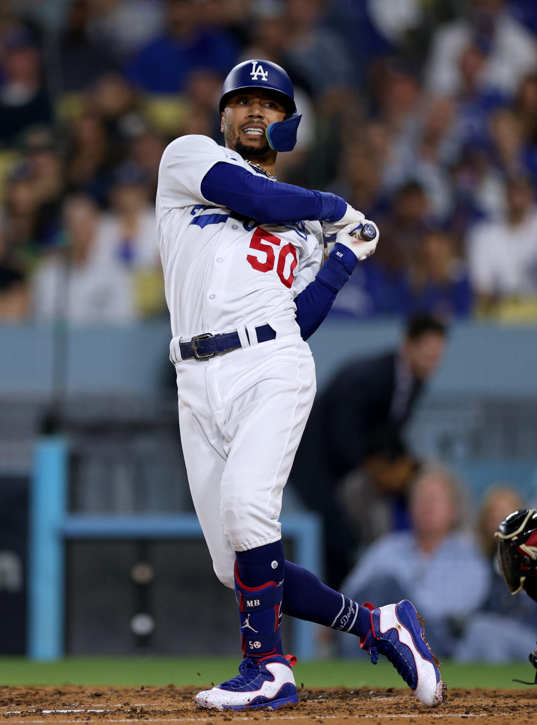 LOS ANGELES, CALIFORNIA - OCTOBER 09: Mookie Betts #50 of the Los Angeles Dodgers reacts to his foul during a 4-2 loss to the Arizona Diamondbacks in Game Two of the Division Series at Dodger Stadium on October 09, 2023 in Los Angeles, California. (Photo by Harry How/Getty Images)