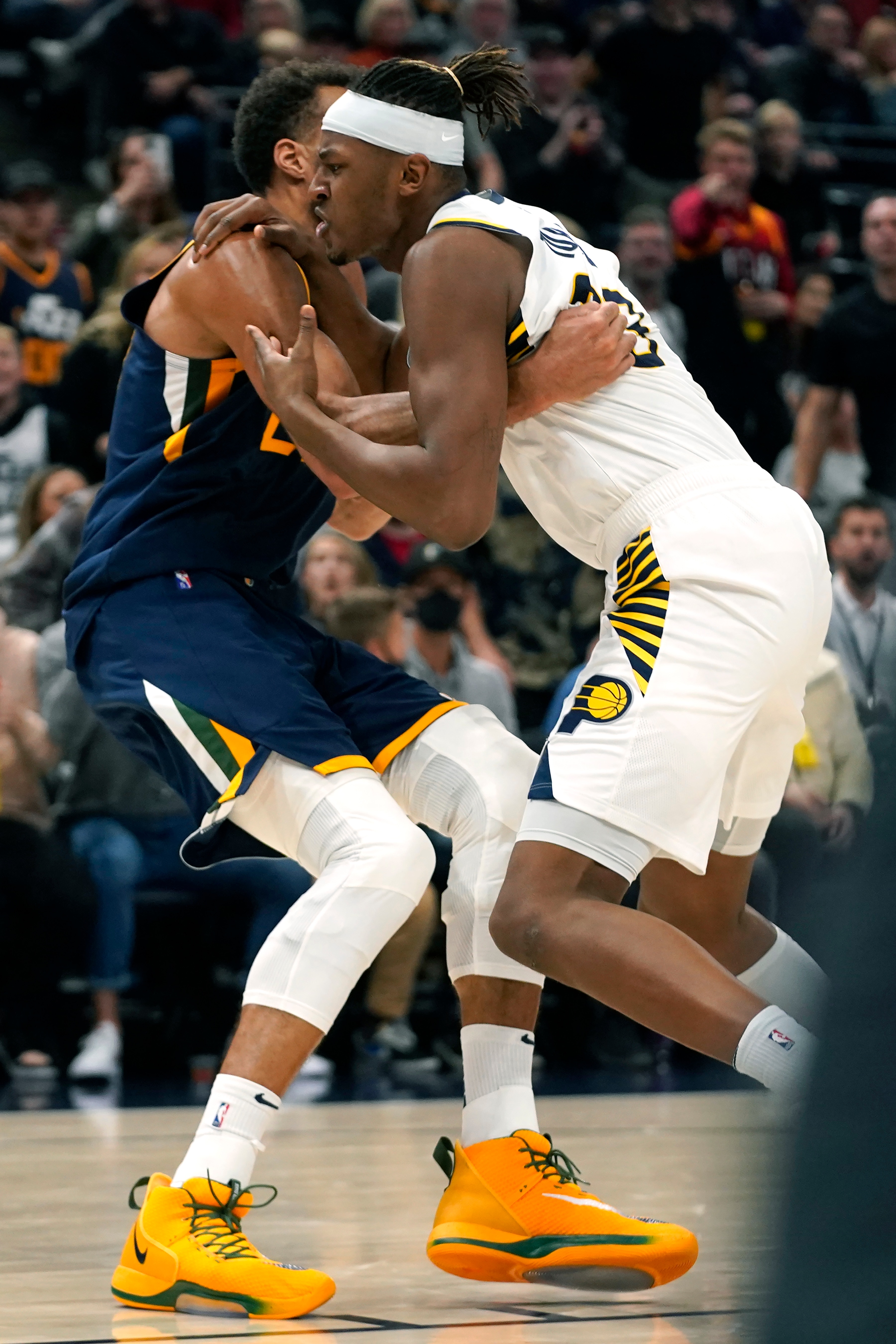 Utah Jazz center Rudy Gobert, left, and Indiana Pacers center Myles Turner, right, get into a fight in the second half, resulting in ejections for both players, during an NBA basketball game Thursday, Nov. 11, 2021, in Salt Lake City. (AP Photo/Rick Bowmer)