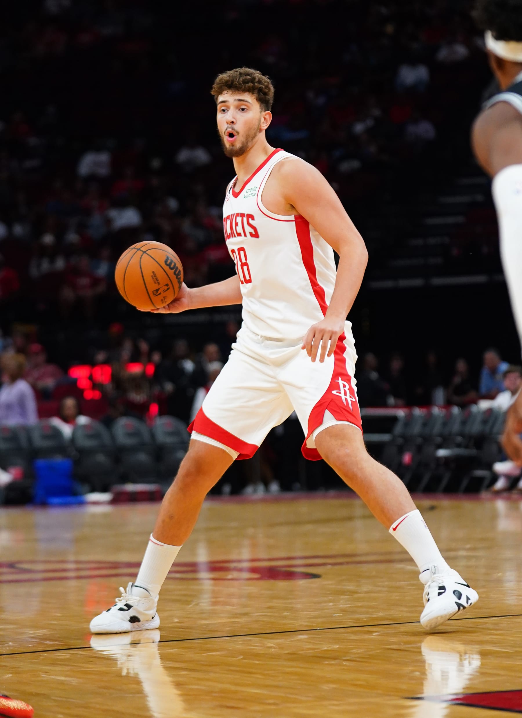 HOUSTON, TEXAS - OCTOBER 02: Alperen Sengun #28 of the Houston Rockets looks to pass during the game against the San Antonio Spurs at Toyota Center on October 02, 2022 in Houston, Texas. NOTE TO USER: User expressly acknowledges and agrees that,  by downloading and or using this photograph,  User is consenting to the terms and conditions of the Getty Images License Agreement. (Photo by Alex Bierens de Haan/Getty Images)