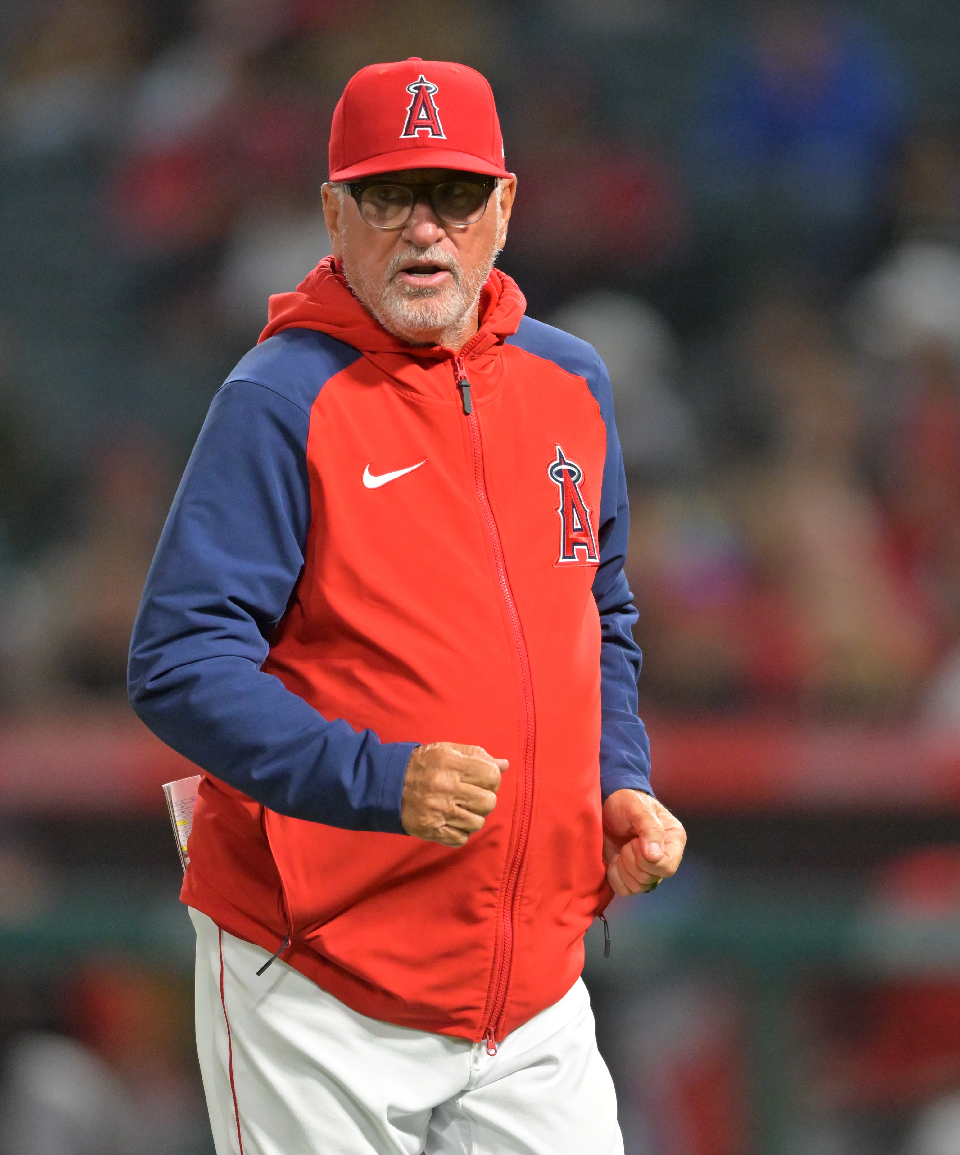 ANAHEIM, CA - APRIL 27:  Manager Joe Maddon #70 of the Los Angeles Angels walks back from the pitchers mound during the game against the Cleveland Guardians at Angel Stadium of Anaheim on April 27, 2022 in Anaheim, California. (Photo by Jayne Kamin-Oncea/Getty Images)