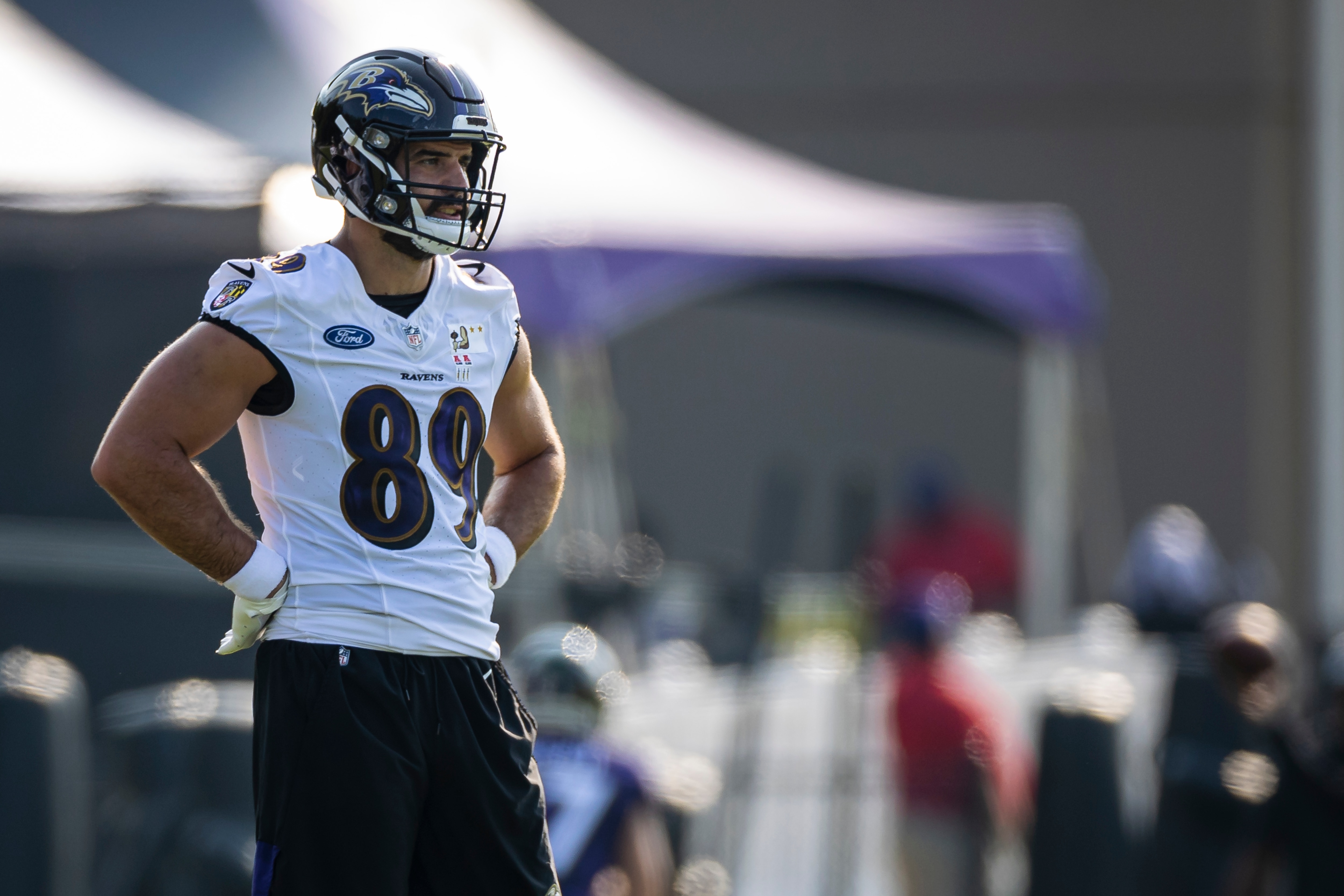 OWINGS MILLS, MD - JULY 28: Mark Andrews #89 of the Baltimore Ravens looks on during training camp at Under Armour Performance Center Baltimore Ravens on July 28, 2021 in Owings Mills, Maryland. (Photo by Scott Taetsch/Getty Images)