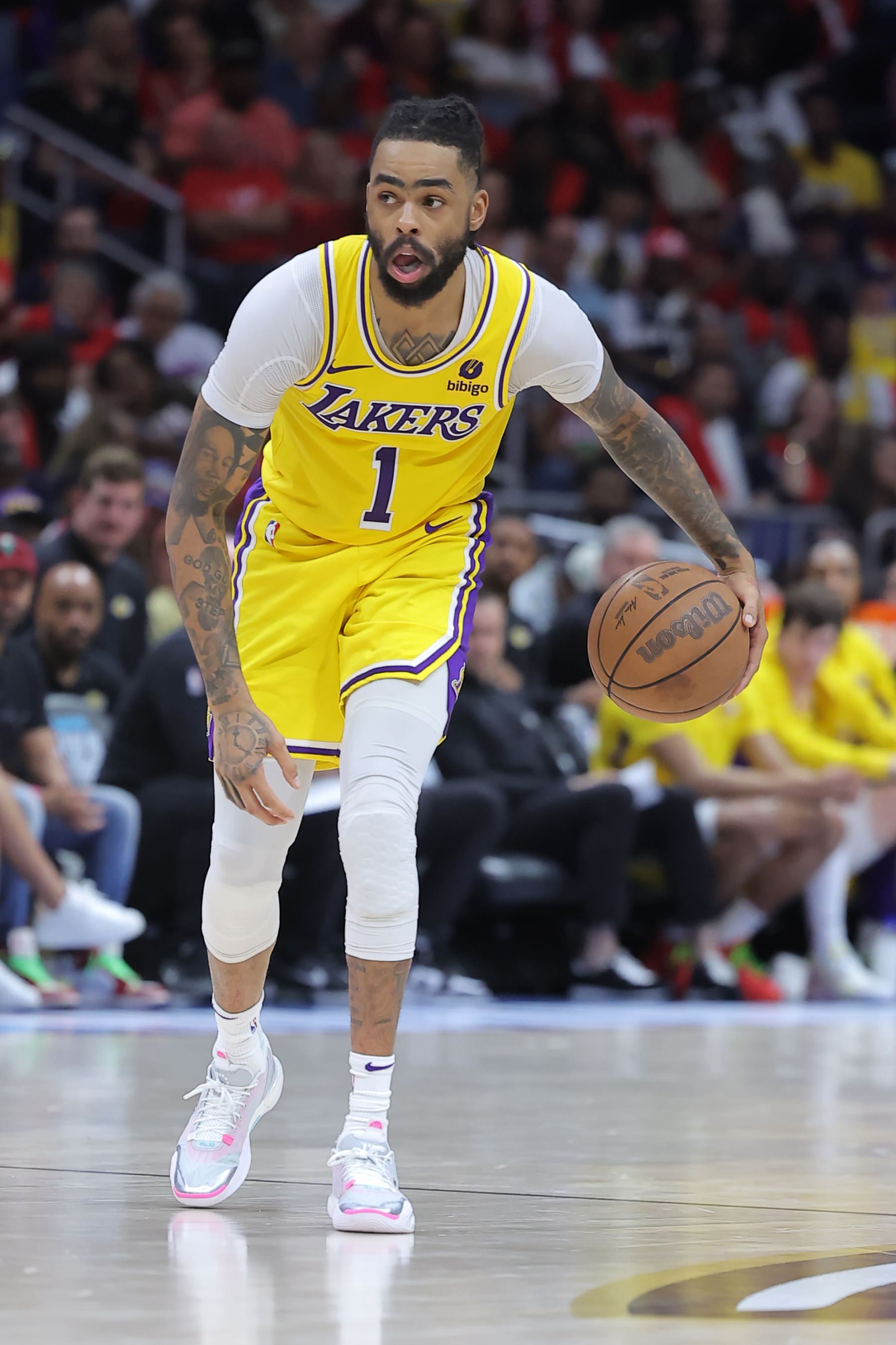 NEW ORLEANS, LOUISIANA - APRIL 16: D'Angelo Russell #1 of the Los Angeles Lakers reacts against the New Orleans Pelicans during a play-in tournament game at the Smoothie King Center on April 16, 2024 in New Orleans, Louisiana. NOTE TO USER: User expressly acknowledges and agrees that, by downloading and or using this Photograph, user is consenting to the terms and conditions of the Getty Images License Agreement. (Photo by Jonathan Bachman/Getty Images)