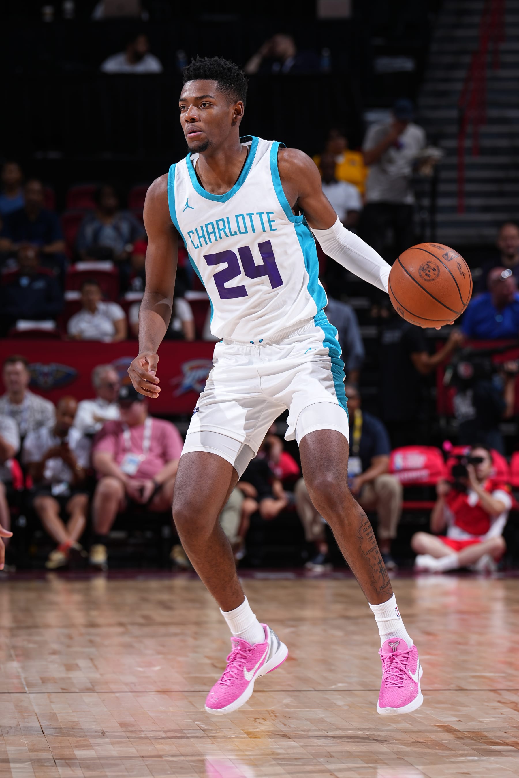 LAS VEGAS, NV - JULY 11: Brandon Miller #24 of the Charlotte Hornets dribbles the ball during the 2023 NBA Las Vegas Summer League  against the Portland Trial Blazers on July 11, 2023 at the Thomas & Mack Center in Las Vegas, Nevada. NOTE TO USER: User expressly acknowledges and agrees that, by downloading and or using this photograph, User is consenting to the terms and conditions of the Getty Images License Agreement. Mandatory Copyright Notice: Copyright 2023 NBAE (Photo by Garrett Ellwood/NBAE via Getty Images)