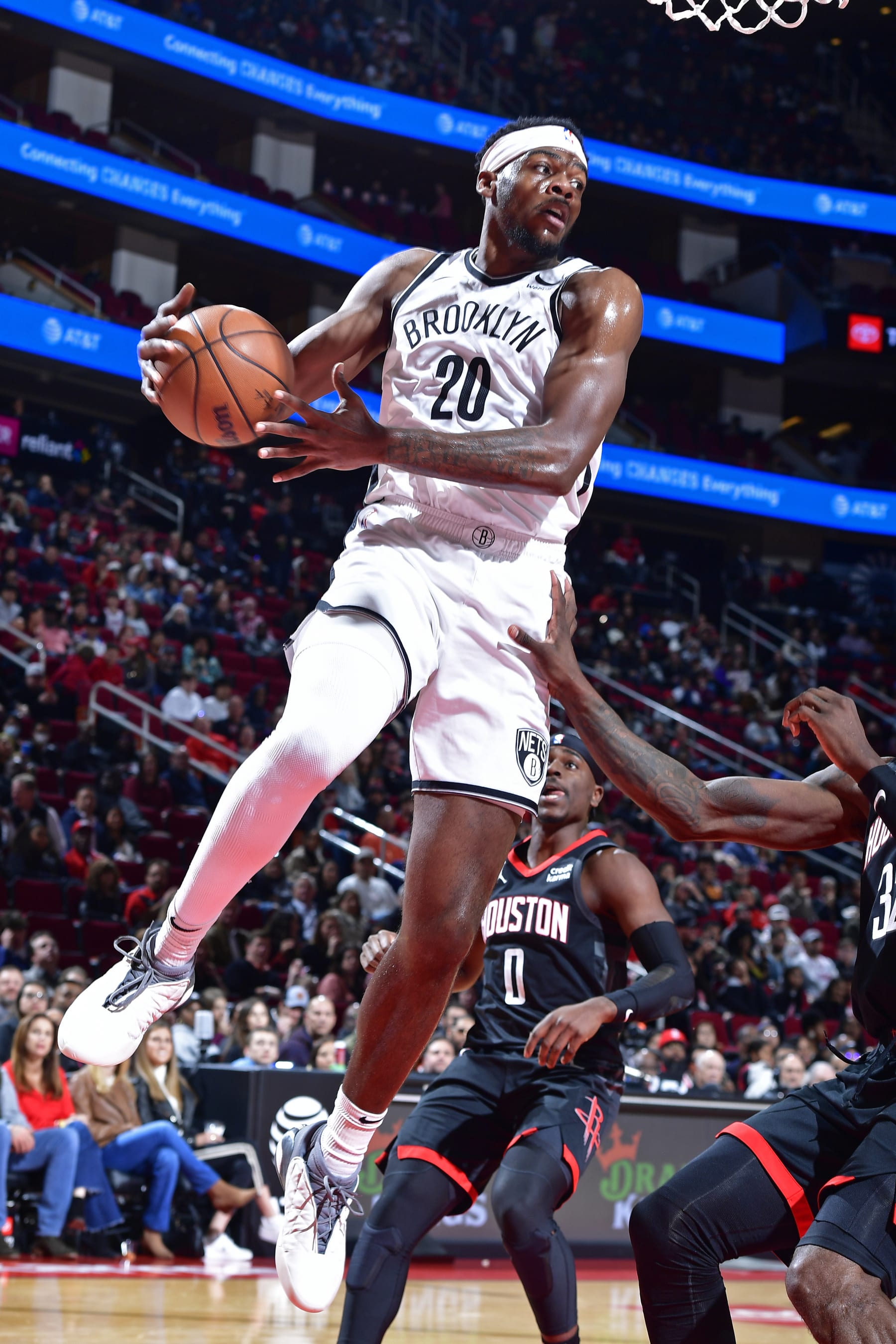 HOUSTON, TX - JANUARY 3: Day'Ron Sharpe #20 of the Brooklyn Nets rebounds during the game against the Houston Rockets on January 3, 2024 at the Toyota Center in Houston, Texas. NOTE TO USER: User expressly acknowledges and agrees that, by downloading and or using this photograph, User is consenting to the terms and conditions of the Getty Images License Agreement. Mandatory Copyright Notice: Copyright 2024 NBAE (Photo by Logan Riely/NBAE via Getty Images)