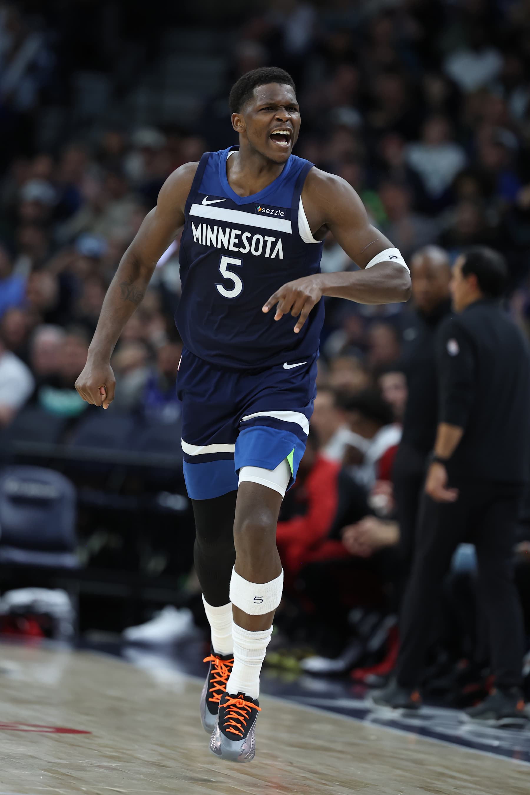 MINNEAPOLIS, MN -  NOVEMBER 10: Anthony Edwards #5 of the Minnesota Timberwolves celebrates during the game against the Miami Heat on November 10, 2024 at Target Center in Minneapolis, Minnesota. NOTE TO USER: User expressly acknowledges and agrees that, by downloading and or using this Photograph, user is consenting to the terms and conditions of the Getty Images License Agreement. Mandatory Copyright Notice: Copyright 2024 NBAE (Photo by David Sherman/NBAE via Getty Images)