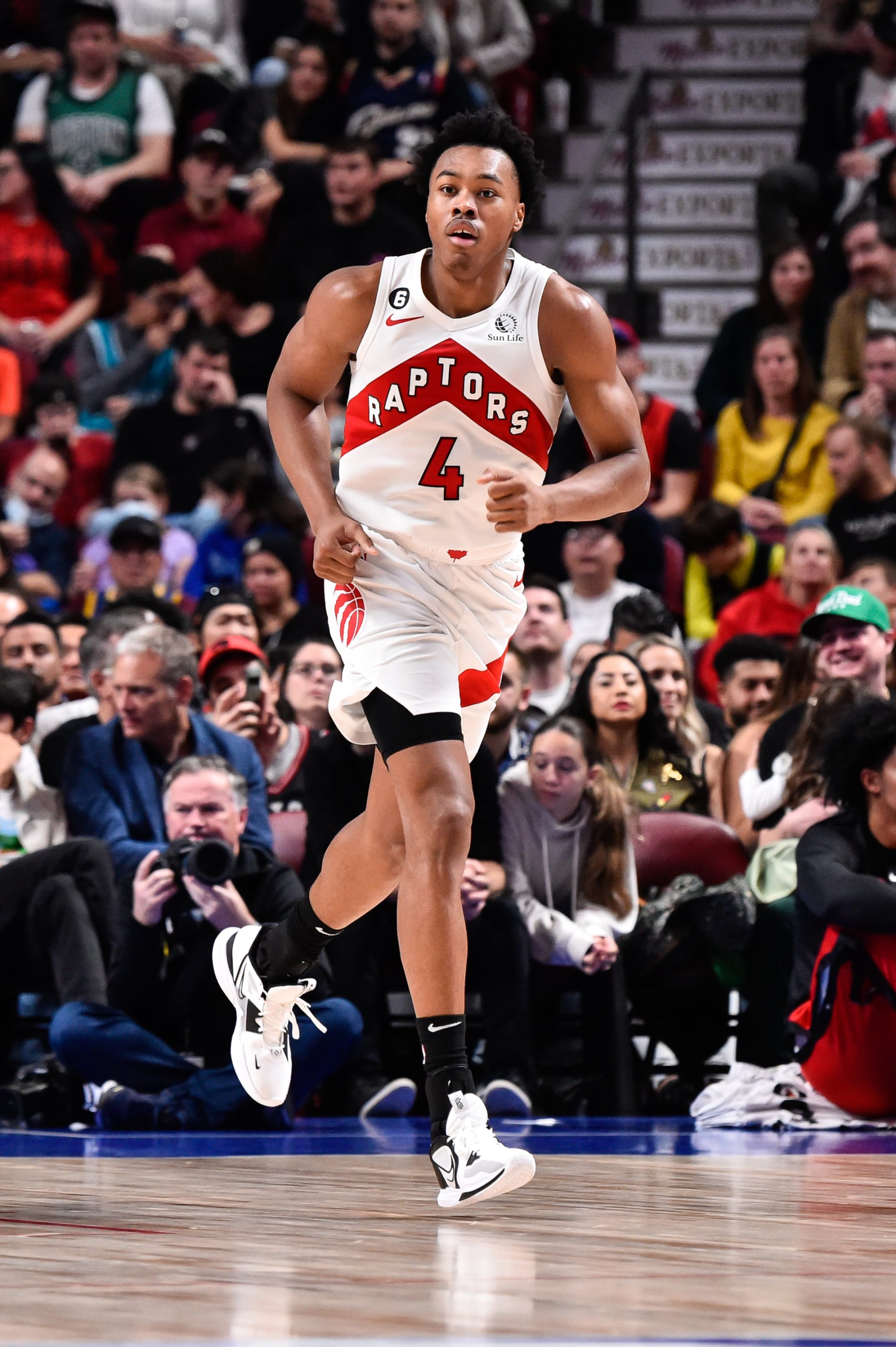 MONTREAL, CANADA - OCTOBER 14:  Scottie Barnes #4 of the Toronto Raptors runs to his position during the first half of a preseason NBA game against the Boston Celtics at Centre Bell on October 14, 2022 in Montreal, Quebec, Canada.  The Toronto Raptors defeated the Boston Celtics 137-134 in overtime.  NOTE TO USER: User expressly acknowledges and agrees that, by downloading and or using this photograph, User is consenting to the terms and conditions of the Getty Images License Agreement.  (Photo by Minas Panagiotakis/Getty Images)