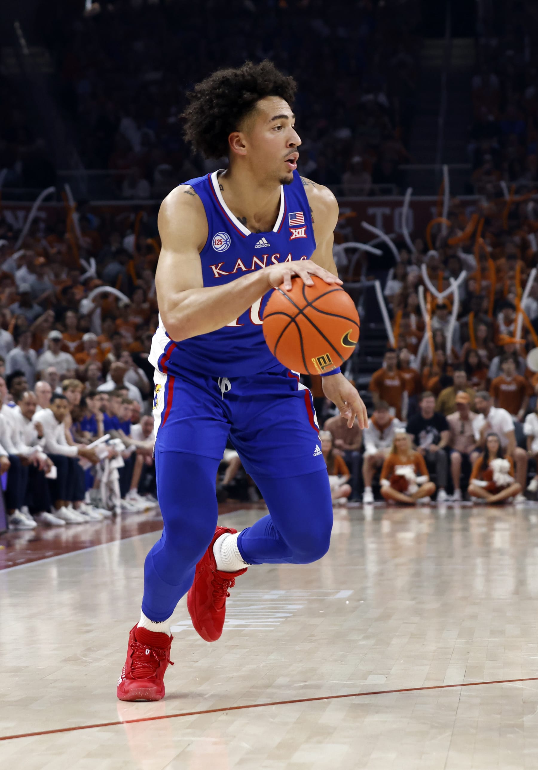 AUSTIN, TX - MARCH 04: Kansas Jayhawks forward Jalen Wilson (10) dribbles up the court against the Texas Longhorns during the game at the Moody Center in Austin, TX on March 04, 2023. (Photo by Adam Davis/Icon Sportswire via Getty Images)