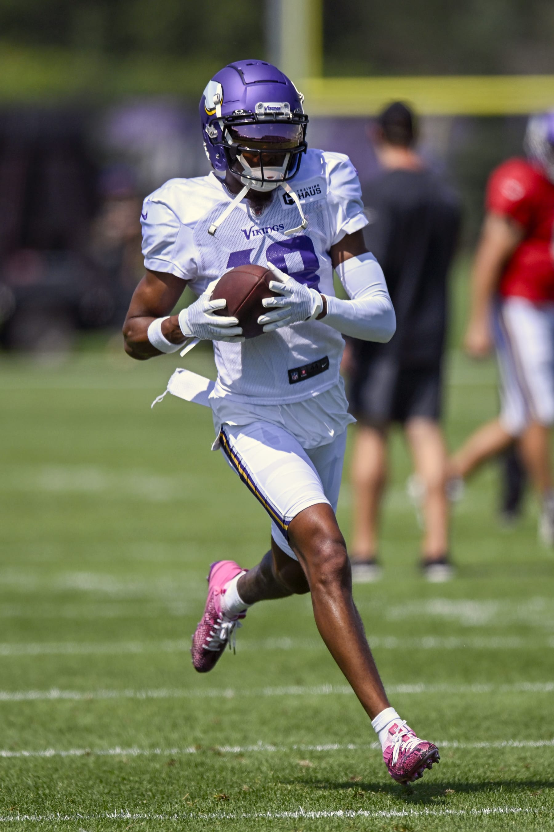 EAGAN, MN - JULY 31: Minnesota Vikings wide receiver Justin Jefferson (18) runs with the ball after the catch during Minnesota Vikings Training Camp at TCO Performance Center on July 31, 2023 in Eagan, Minnesota.(Photo by Nick Wosika/Icon Sportswire via Getty Images)
