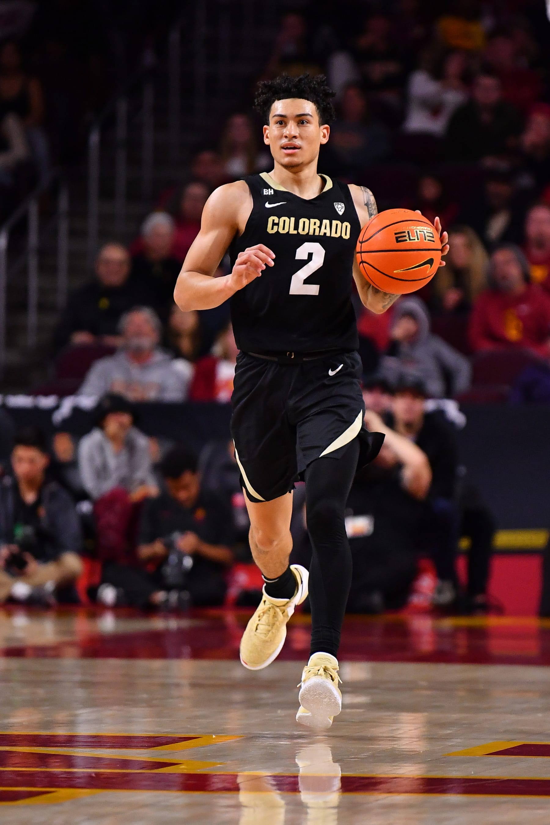 LOS ANGELES, CA - FEBRUARY 17: Colorado Buffaloes guard KJ Simpson (2) dribbles up the court during the college basketball game between the Colorado Buffaloes and the USC Trojans on February 17, 2024 at Galen Center in Los Angeles, CA. (Photo by Brian Rothmuller/Icon Sportswire via Getty Images)