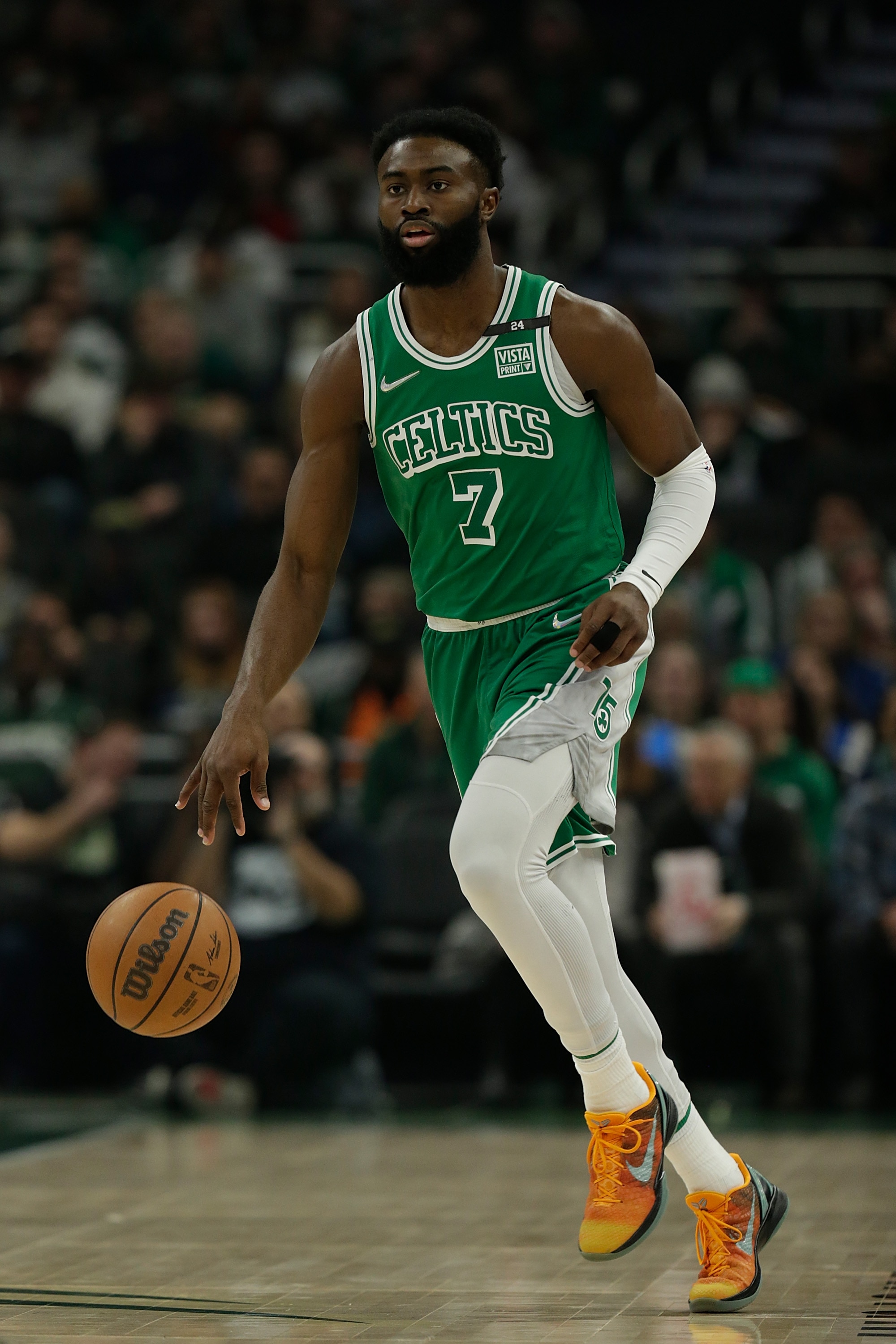 MILWAUKEE, WISCONSIN - APRIL 07: Jaylen Brown #7 of the Boston Celtics dribbles the basketball down court during the first half of the game against the Milwaukee Bucks at Fiserv Forum on April 07, 2022 in Milwaukee, Wisconsin. NOTE TO USER: User expressly acknowledges and agrees that, by downloading and or using this photograph, User is consenting to the terms and conditions of the Getty Images License Agreement. (Photo by John Fisher/Getty Images)