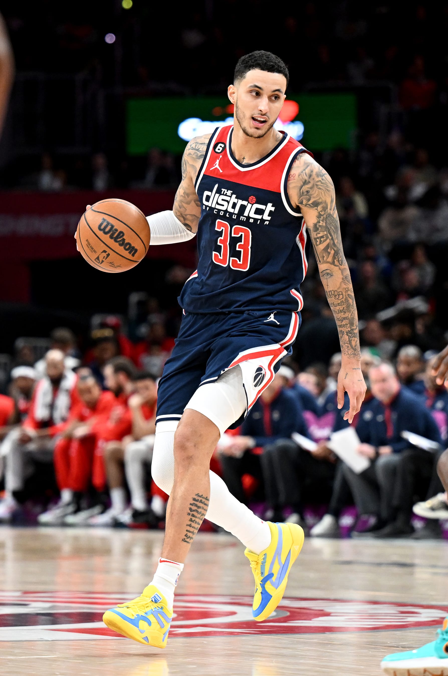 WASHINGTON, DC - MARCH 18: Kyle Kuzma #33 of the Washington Wizards handles the ball against the Sacramento Kings at Capital One Arena on March 18, 2023 in Washington, DC.  NOTE TO USER: User expressly acknowledges and agrees that, by downloading and or using this photograph, User is consenting to the terms and conditions of the Getty Images License Agreement.  (Photo by G Fiume/Getty Images)