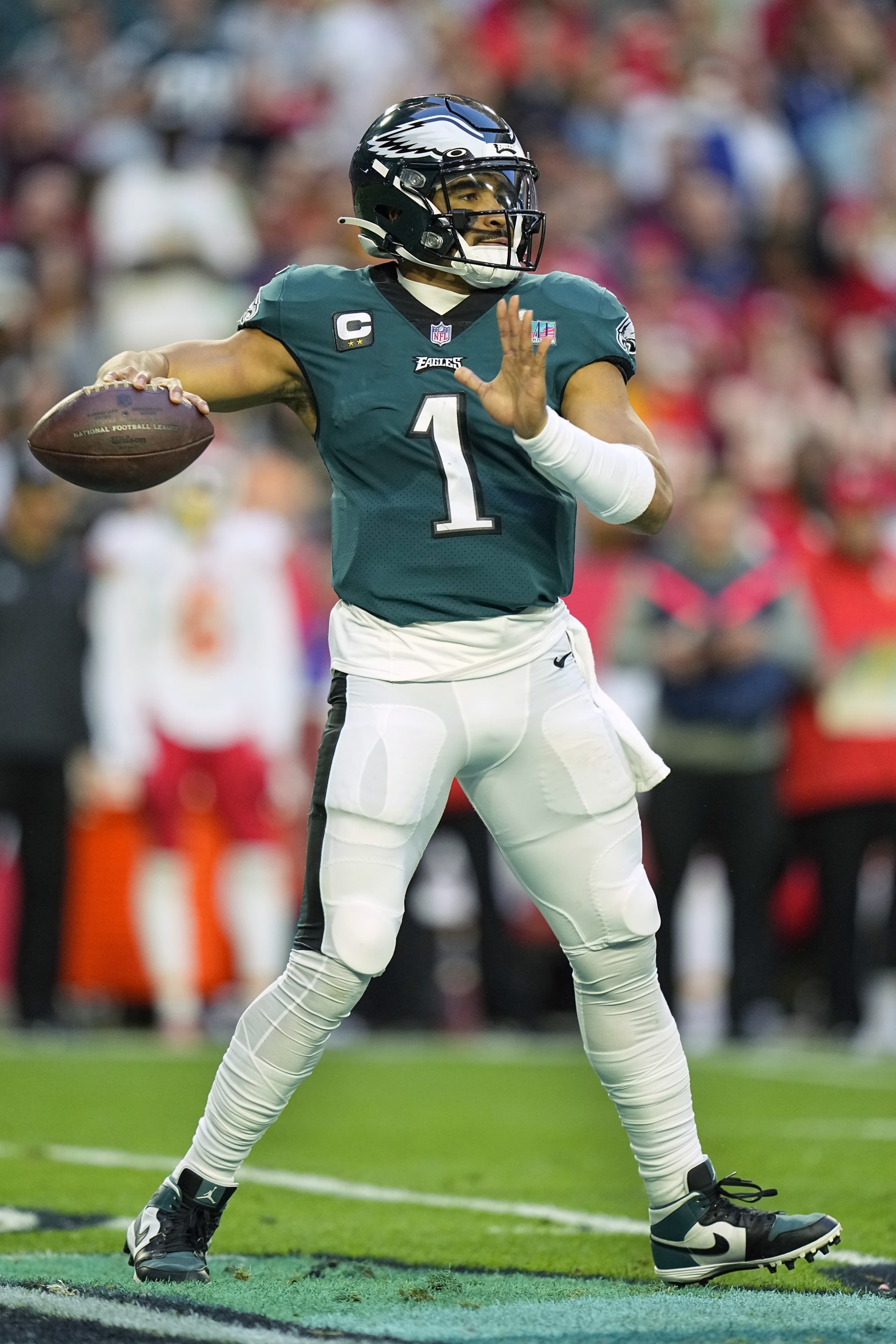 Philadelphia Eagles quarterback Jalen Hurts (1) looks to pass during the first half of the NFL Super Bowl 57 football game against the Kansas City Chiefs, Sunday, Feb. 12, 2023, in Phoenix. (AP Photo/Abbie Parr)