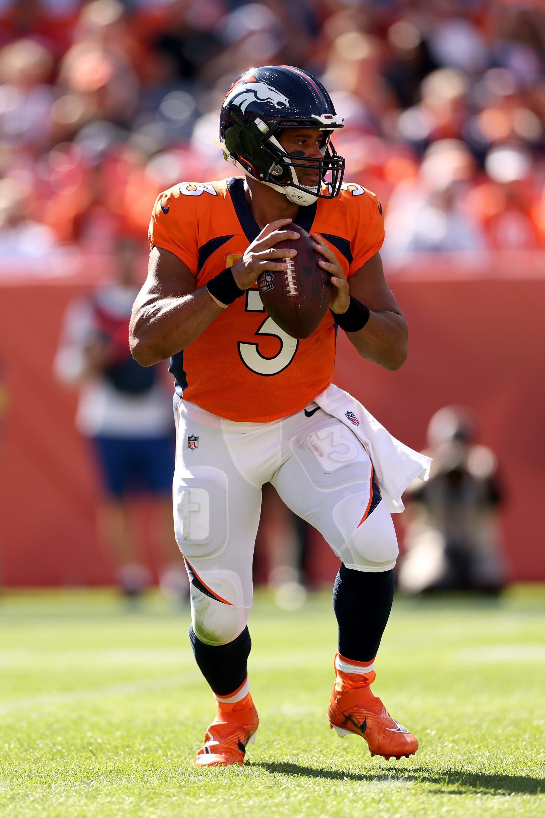 DENVER, COLORADO - SEPTEMBER 18: Russell Wilson #3 of the Denver Broncos throws the ball during the first half of the game against the Houston Texans at Empower Field At Mile High on September 18, 2022 in Denver, Colorado. (Photo by Matthew Stockman/Getty Images) DENVER, COLORADO - SEPTEMBER 18: Russell Wilson #3 of the Denver Broncos throws the ball during the first half of the game against the Houston Texans at Empower Field At Mile High on September 18, 2022 in Denver, Colorado. (Photo by Matthew Stockman/Getty Images)