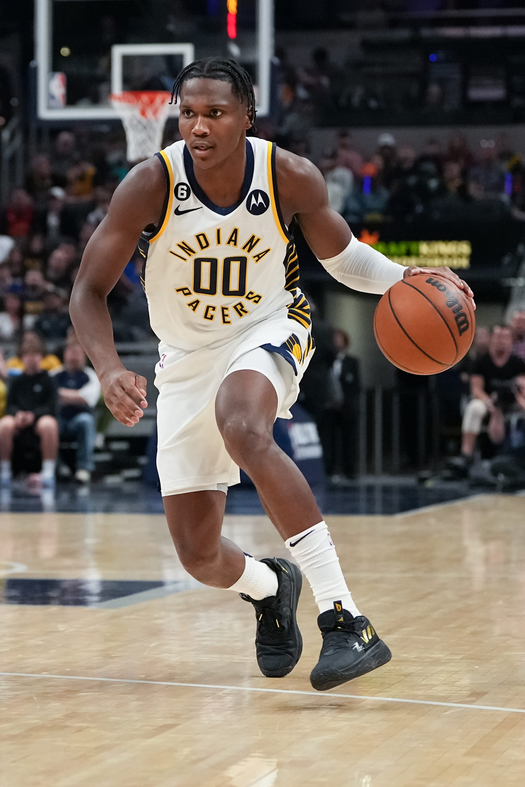 INDIANAPOLIS, INDIANA - OCTOBER 22: Bennedict Mathurin #00 of the Indiana Pacers dribbles the ball in the second quarter against the Detroit Pistons at Gainbridge Fieldhouse on October 22, 2022 in Indianapolis, Indiana. NOTE TO USER: User expressly acknowledges and agrees that, by downloading and or using this photograph, User is consenting to the terms and conditions of the Getty Images License Agreement. (Photo by Dylan Buell/Getty Images)