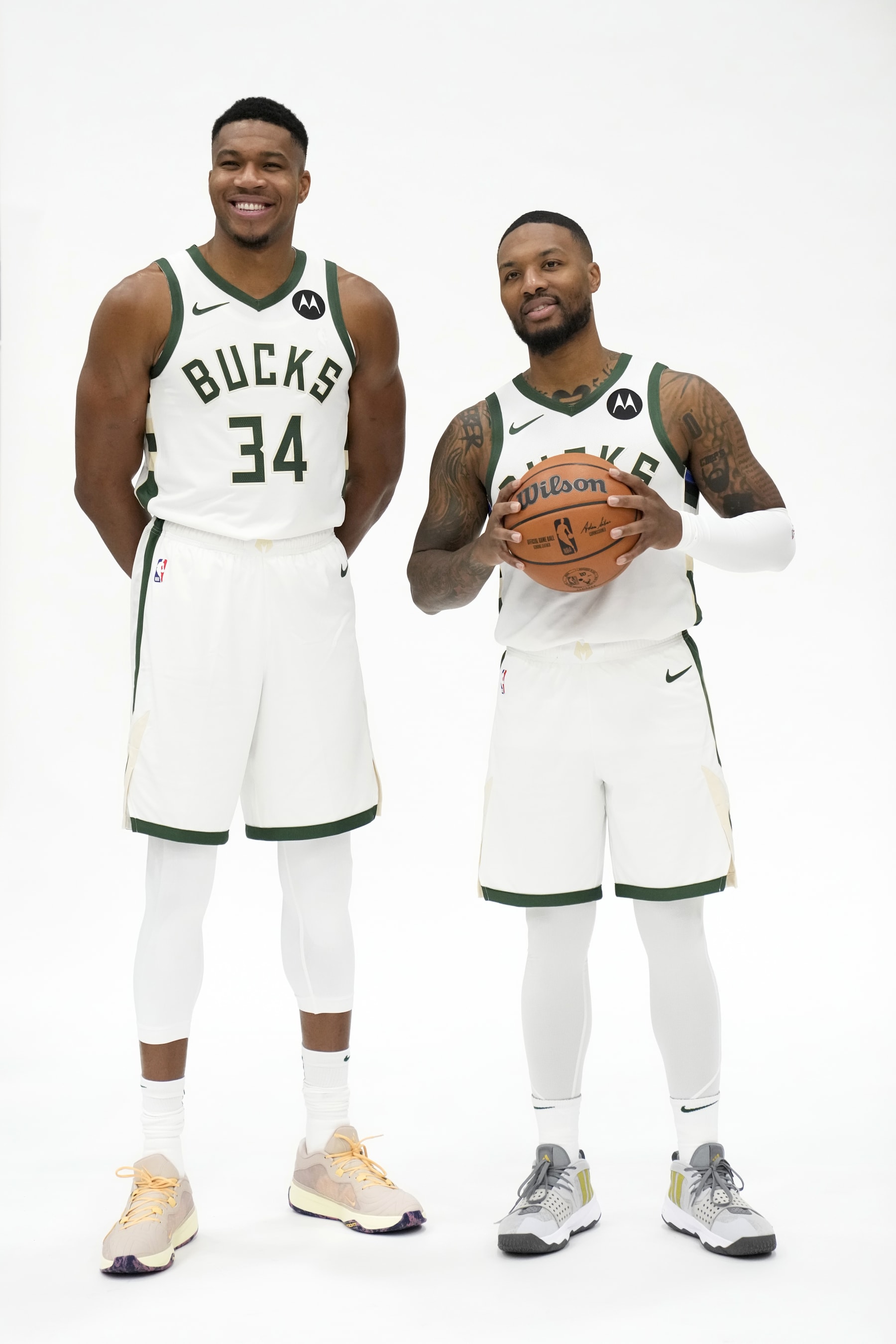 MILWAUKEE, WISCONSIN - OCTOBER 02: Giannis Antetokounmpo #34 and Damian Lillard #0 of the Milwaukee Bucks pose for portraits during media day on October 02, 2023 in Milwaukee, Wisconsin. NOTE TO USER: User expressly acknowledges and agrees that, by downloading and or using this photograph, User is consenting to the terms and conditions of the Getty Images License Agreement. (Photo by Patrick McDermott/Getty Images)