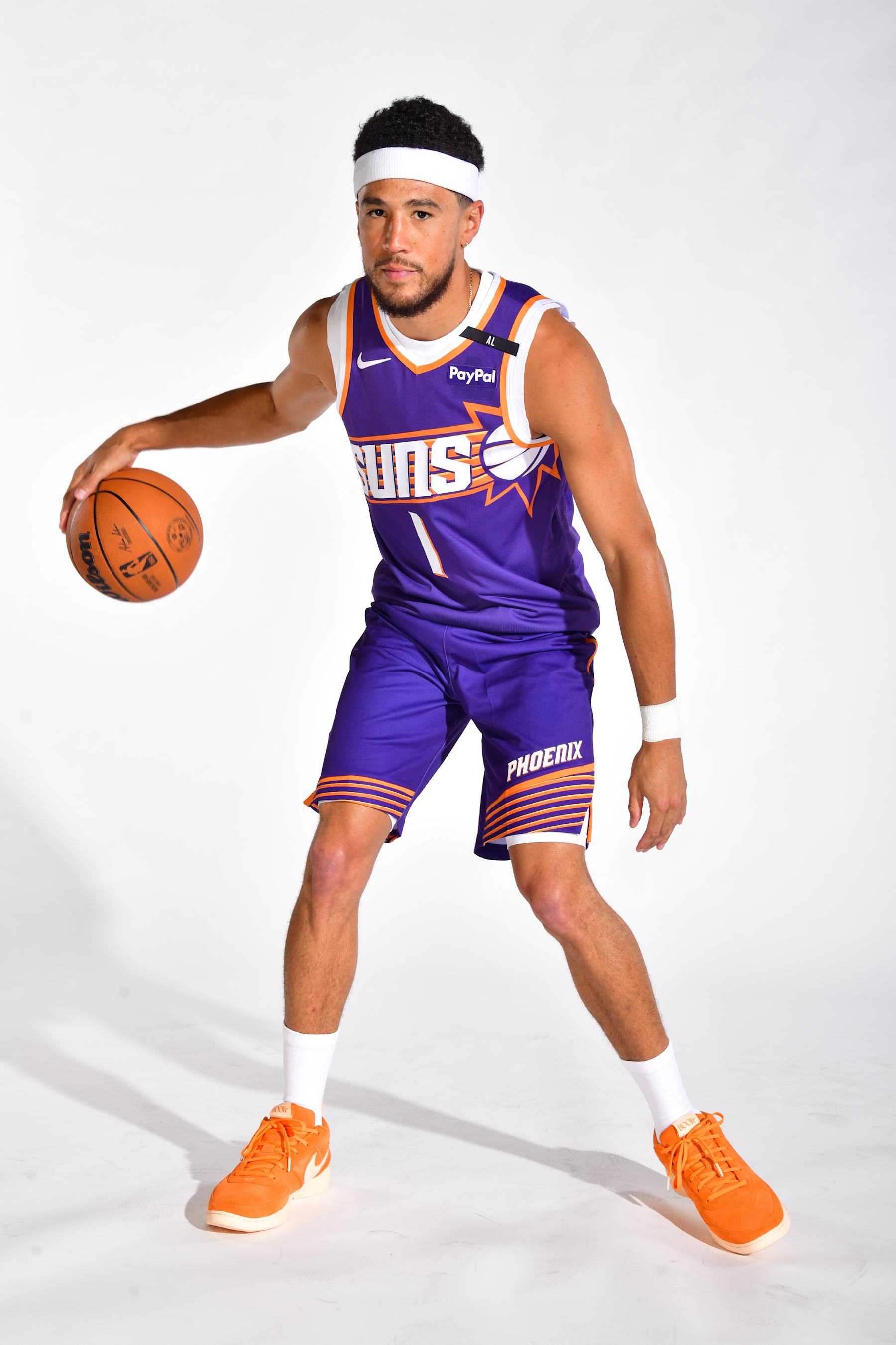 PHOENIX, AZ - SEPTEMBER 30: Devin Booker #1 of the Phoenix Suns poses for a portrait during NBA Media Day on September 30, 2024 at the Footprint Center in Phoenix, Arizona. NOTE TO USER: User expressly acknowledges and agrees that, by downloading and or using this photograph, user is consenting to the terms and conditions of the Getty Images License Agreement.  Mandatory Copyright Notice: Copyright 2024 NBAE (Photo by Barry Gossage/NBAE via Getty Images)