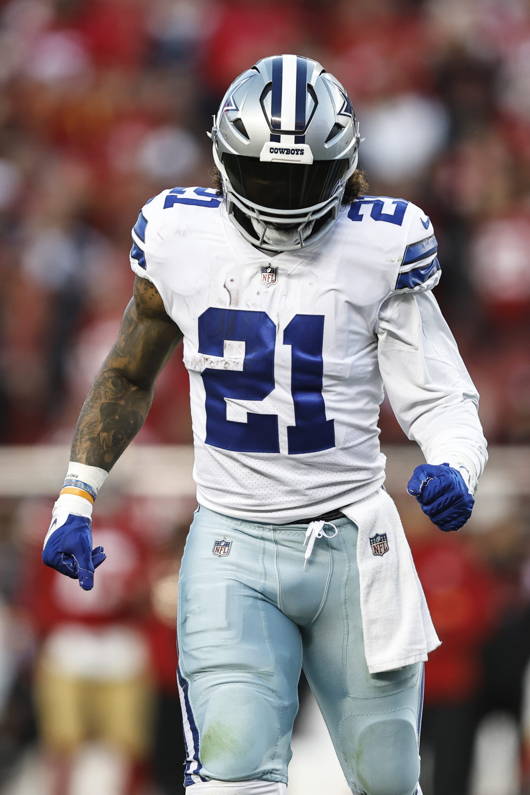SANTA CLARA, CALIFORNIA - JANUARY 22: Ezekiel Elliott #21 of the Dallas Cowboys looks on during an NFL divisional round playoff football game between the San Francisco 49ers and the Dallas Cowboys at Levi's Stadium on January 22, 2023 in Santa Clara, California. (Photo by Michael Owens/Getty Images)