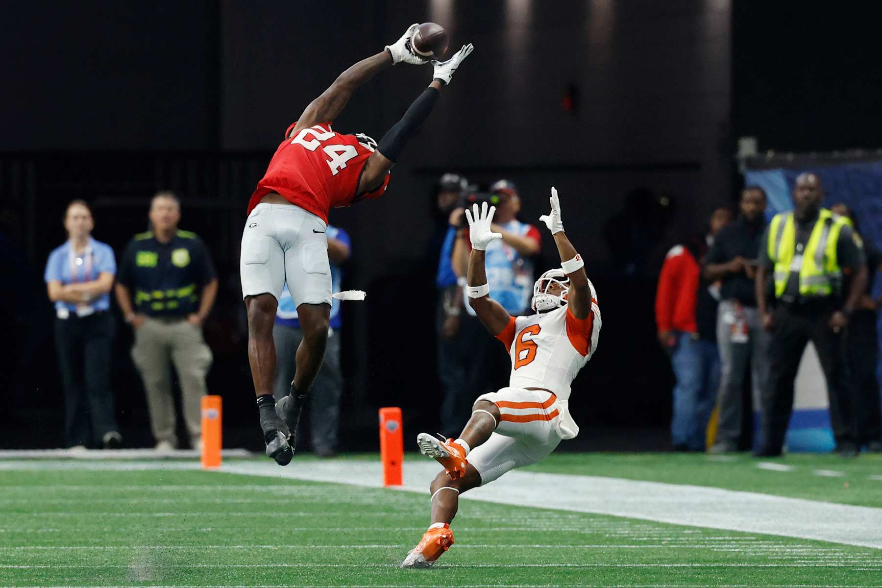 ATLANTA, GA - AUGUST 31: Georgia Bulldogs defensive back Malaki Starks (24) intercepts a pass in front of Clemson Tigers wide receiver Tyler Brown (6) during the AFLAC Kickoff college football game on August 31, 2024 at Mercedes-Benz Stadium in Atlanta, Georgia. (Photo by Joe Robbins/Icon Sportswire via Getty Images)