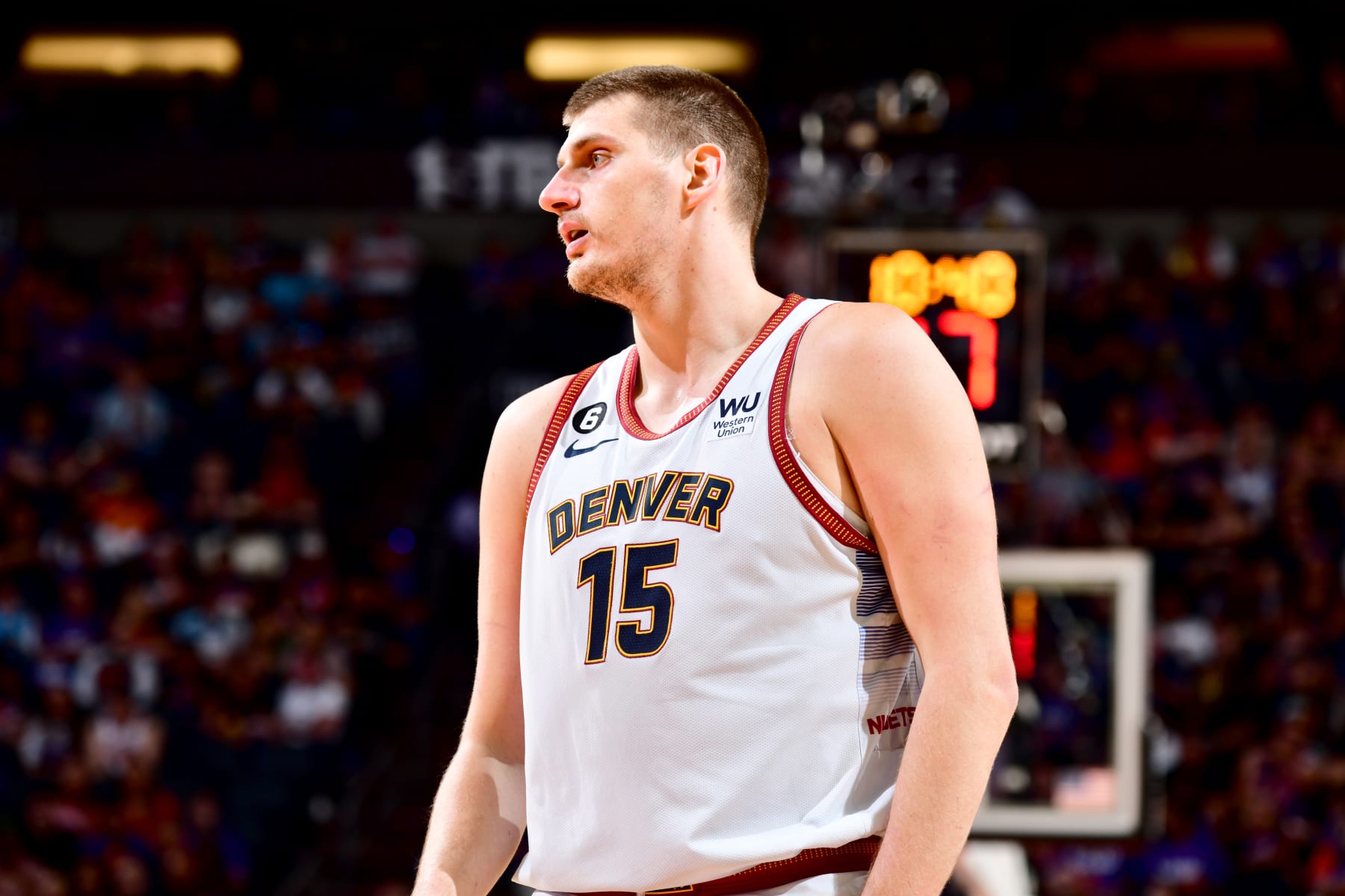 PHOENIX, AZ - MAY 5: Nikola Jokic #15 of the Denver Nuggets looks on during Game 3 of the 2023 NBA Playoffs Western Conference Semi-Finals against the Phoenix Suns on May 5, 2023 at Footprint Center in Phoenix, Arizona. NOTE TO USER: User expressly acknowledges and agrees that, by downloading and or using this photograph, user is consenting to the terms and conditions of the Getty Images License Agreement. Mandatory Copyright Notice: Copyright 2023 NBAE (Photo by Barry Gossage/NBAE via Getty Images)