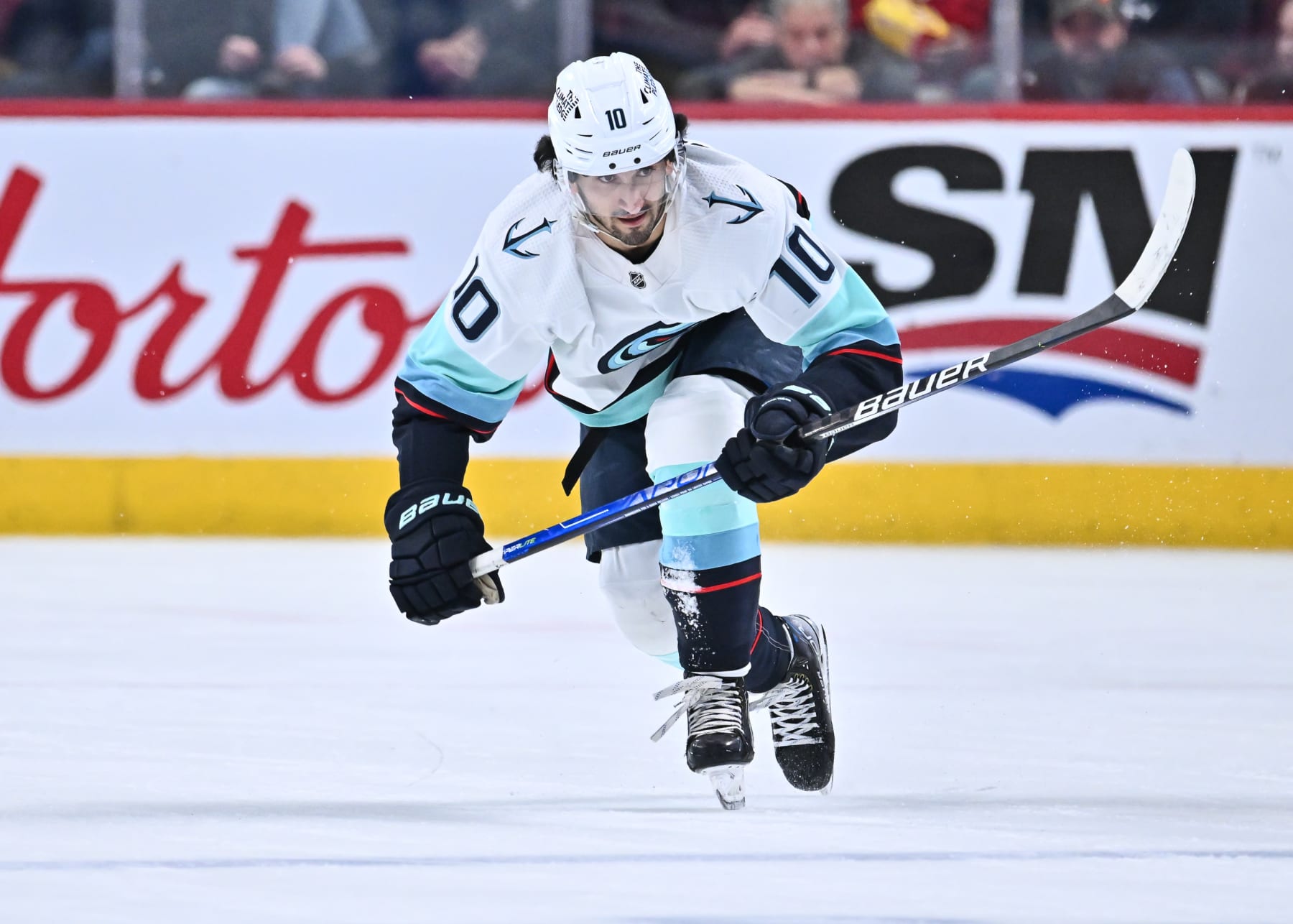 MONTREAL, CANADA - JANUARY 09:  Matty Beniers #10 of the Seattle Kraken skates during the first period against the Montreal Canadiens at Centre Bell on January 9, 2023 in Montreal, Quebec, Canada.  The Seattle Kraken defeated the Montreal Canadiens 4-0.  (Photo by Minas Panagiotakis/Getty Images)