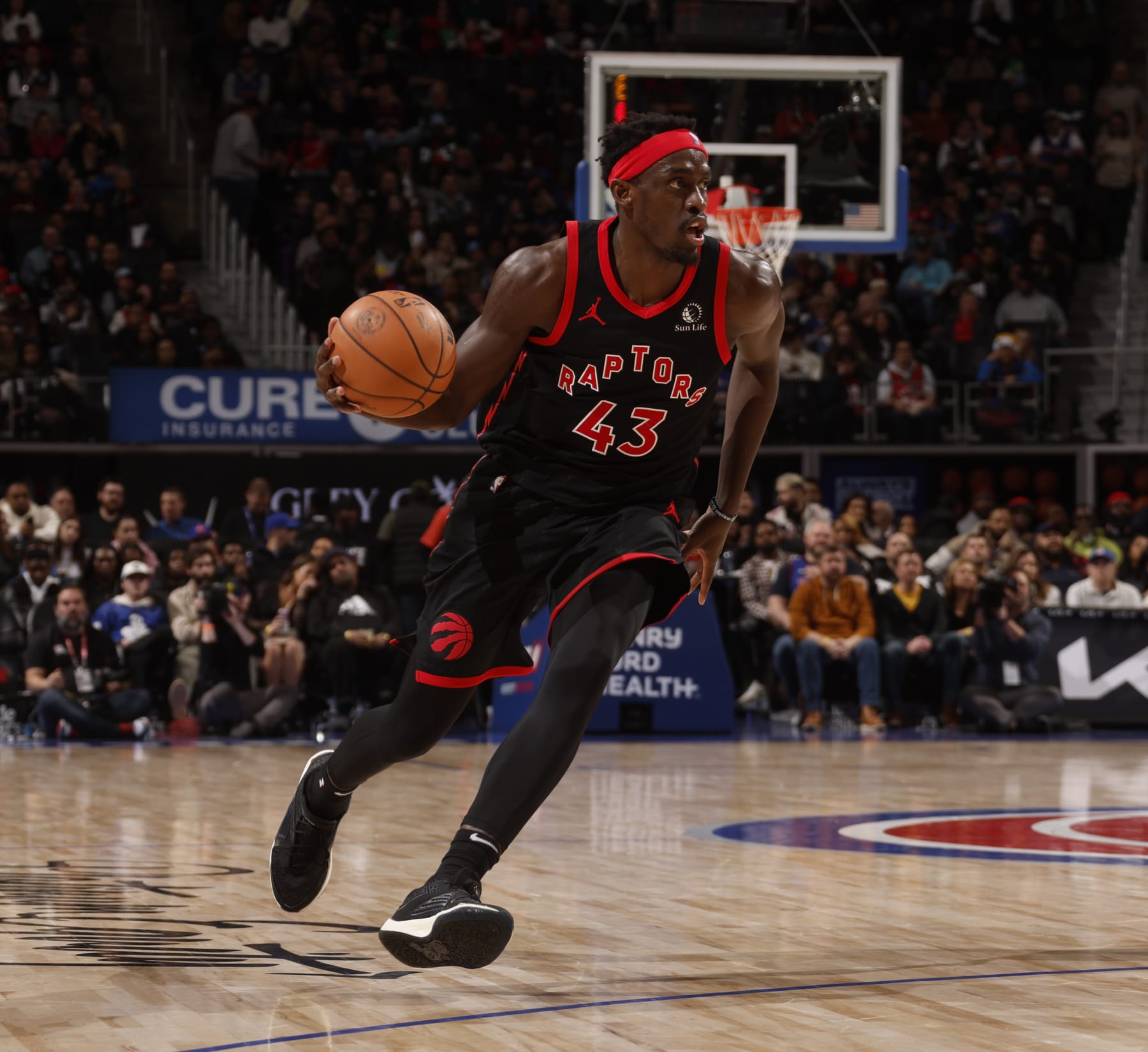DETROIT, MI - DECEMBER 30: Pascal Siakam #43 of the Toronto Raptors dribbles the ball during the game against the Detroit Pistons on December 30, 2023 at Little Caesars Arena in Detroit, Michigan. NOTE TO USER: User expressly acknowledges and agrees that, by downloading and/or using this photograph, User is consenting to the terms and conditions of the Getty Images License Agreement. Mandatory Copyright Notice: Copyright 2023 NBAE (Photo by Brian Sevald/NBAE via Getty Images)