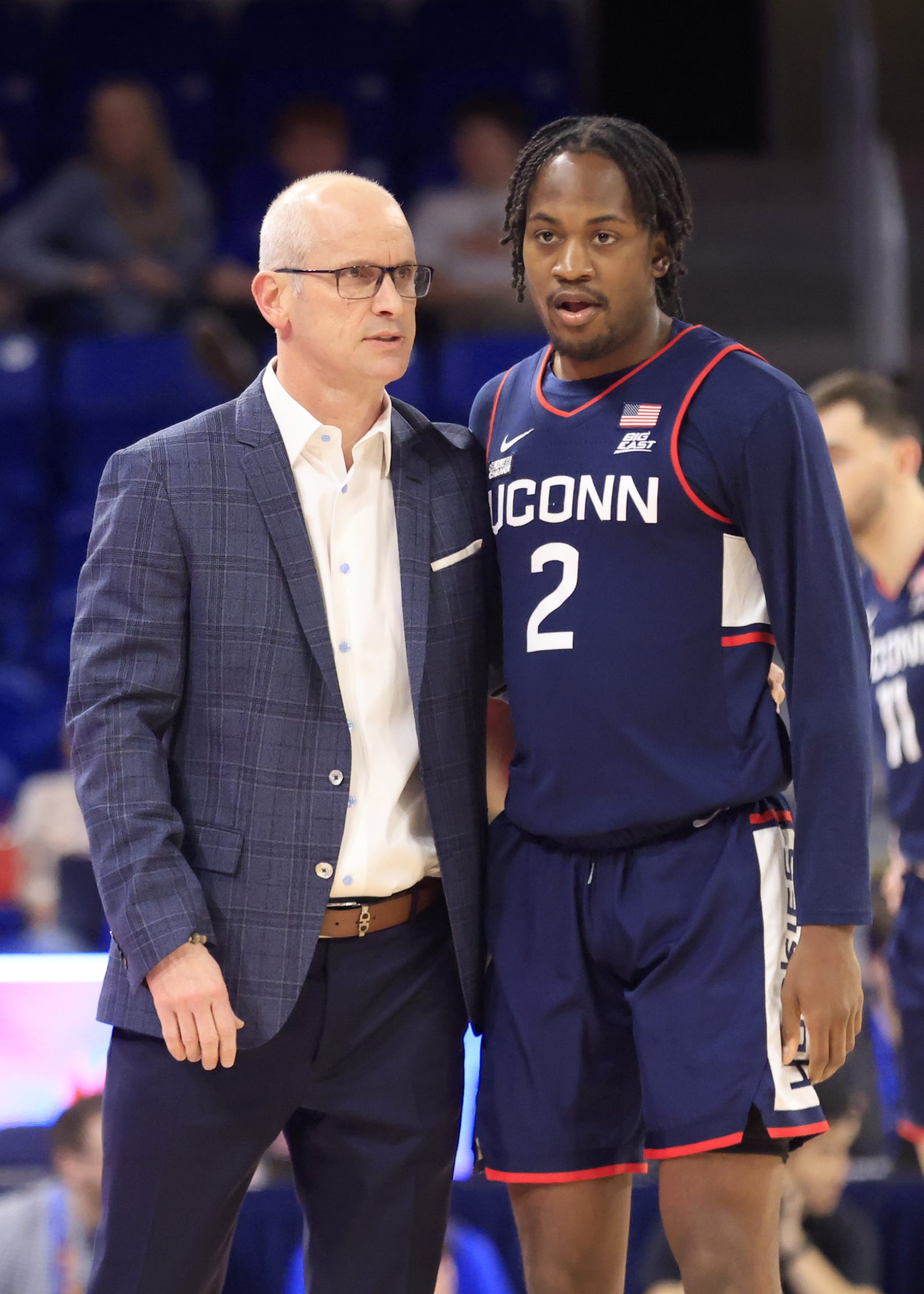 CHICAGO, ILLINOIS - FEBRUARY 14: Head coach Dan Hurley of the Connecticut Huskies speaks with Tristen Newton #2 during the first half in the game against the DePaul Blue Demons at Wintrust Arena on February 14, 2024 in Chicago, Illinois. (Photo by Justin Casterline/Getty Images)