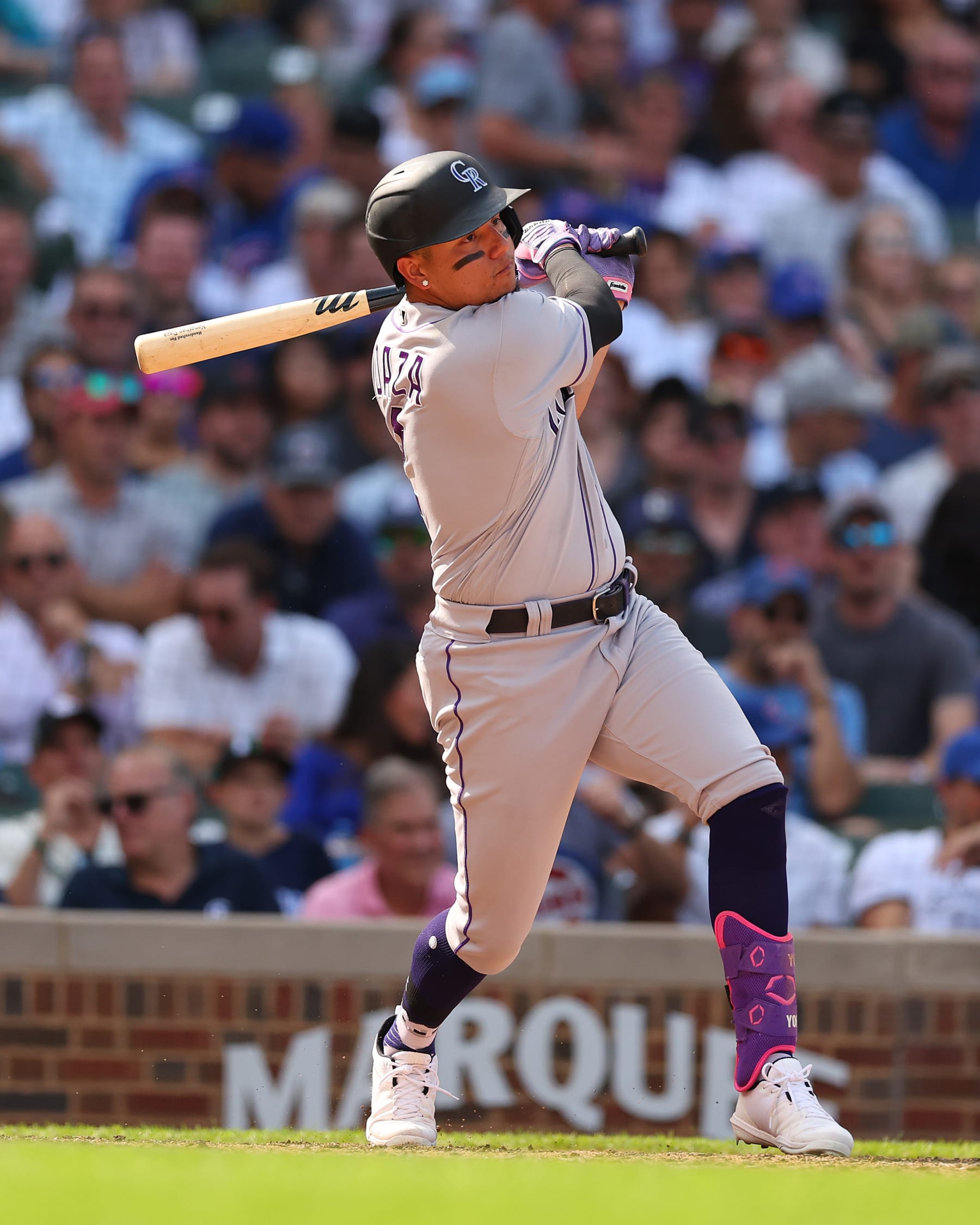 CHICAGO, ILLINOIS - SEPTEMBER 16: Yonathan Daza #2 of the Colorado Rockies at bat against the Chicago Cubs at Wrigley Field on September 16, 2022 in Chicago, Illinois. (Photo by Michael Reaves/Getty Images)