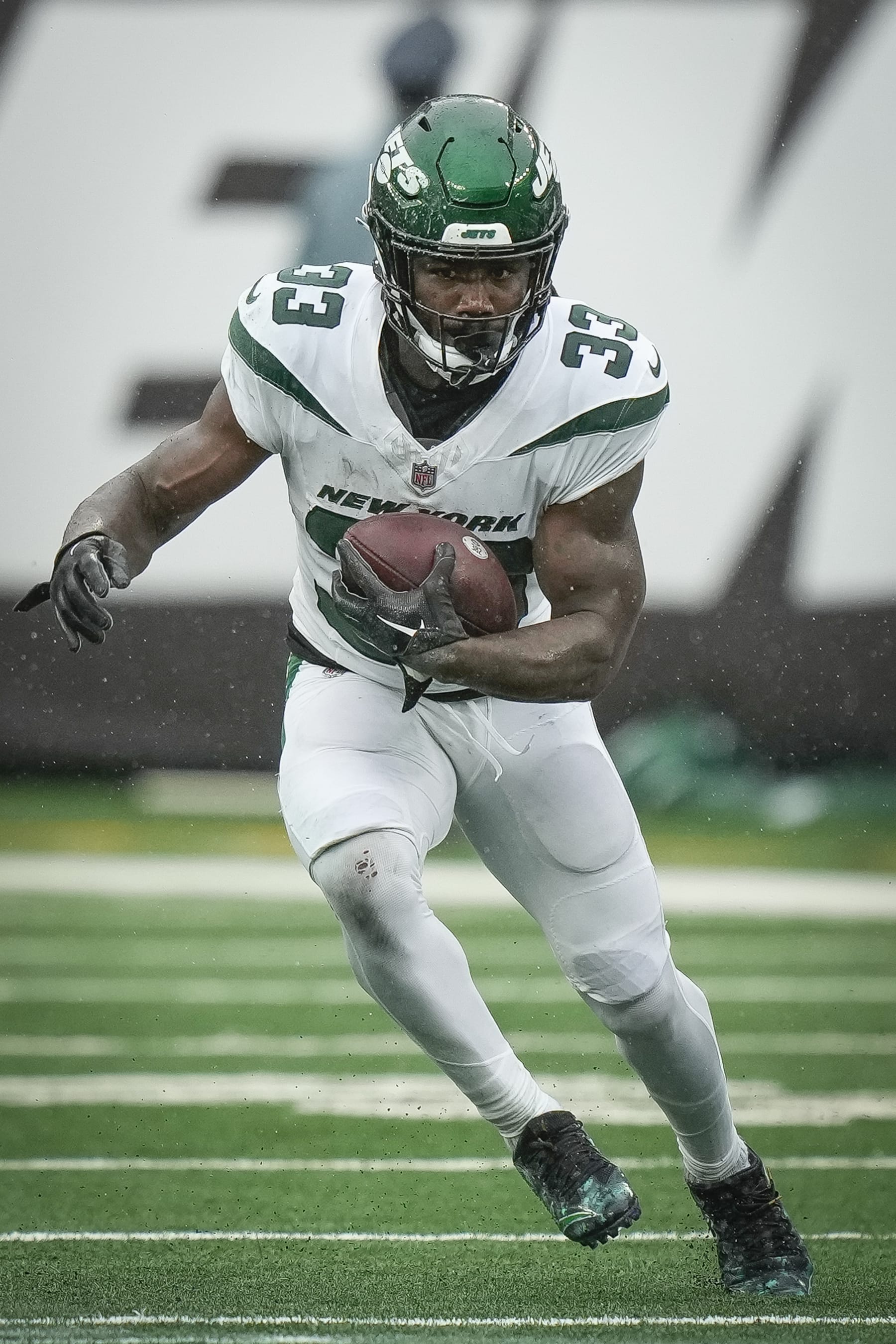 New York Jets running back Dalvin Cook (33) runs with the ball during the second half an NFL football game against the New England Patriots on Sunday Sept. 24, 2023, in New York. (AP Photo/Bryan Woolston)