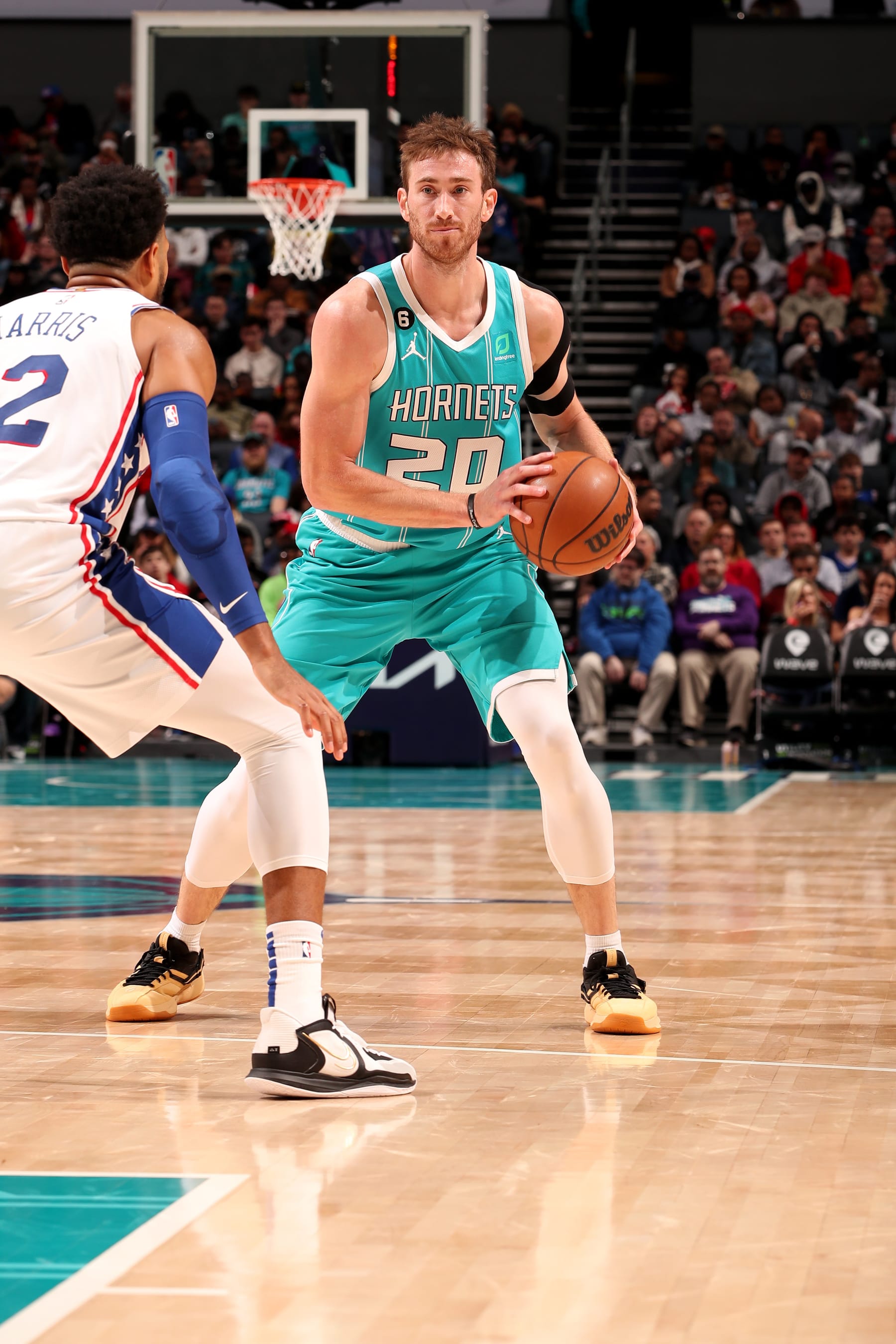 CHARLOTTE, NC - NOVEMBER 23: Gordon Hayward #20 of the Charlotte Hornets looks to pass the ball during the game against the Philadelphia 76ers on November 23, 2022 at Spectrum Center in Charlotte, North Carolina. NOTE TO USER: User expressly acknowledges and agrees that, by downloading and or using this photograph, User is consenting to the terms and conditions of the Getty Images License Agreement. Mandatory Copyright Notice: Copyright 2022 NBAE (Photo by Kent Smith/NBAE via Getty Images)