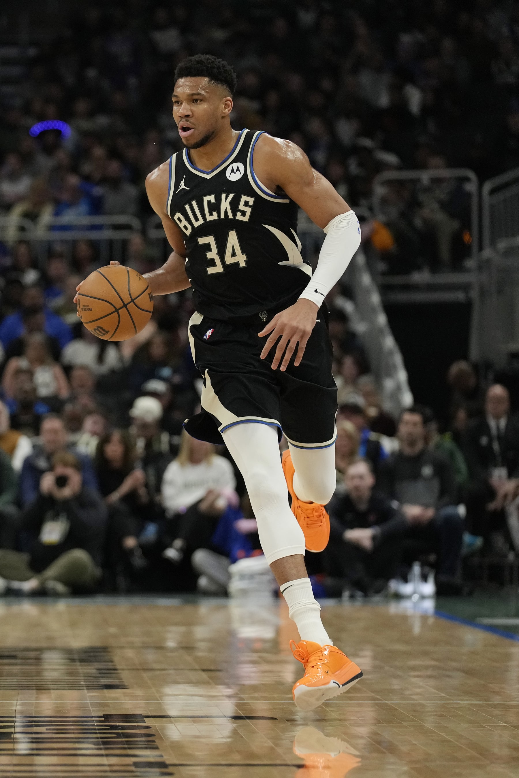MILWAUKEE, WISCONSIN - APRIL 07: Giannis Antetokounmpo #34 of the Milwaukee Bucks dribbles the ball during the first half against the New York Knicks at Fiserv Forum on April 07, 2024 in Milwaukee, Wisconsin. NOTE TO USER: User expressly acknowledges and agrees that, by downloading and or using this photograph, User is consenting to the terms and conditions of the Getty Images License Agreement. (Photo by Patrick McDermott/Getty Images)