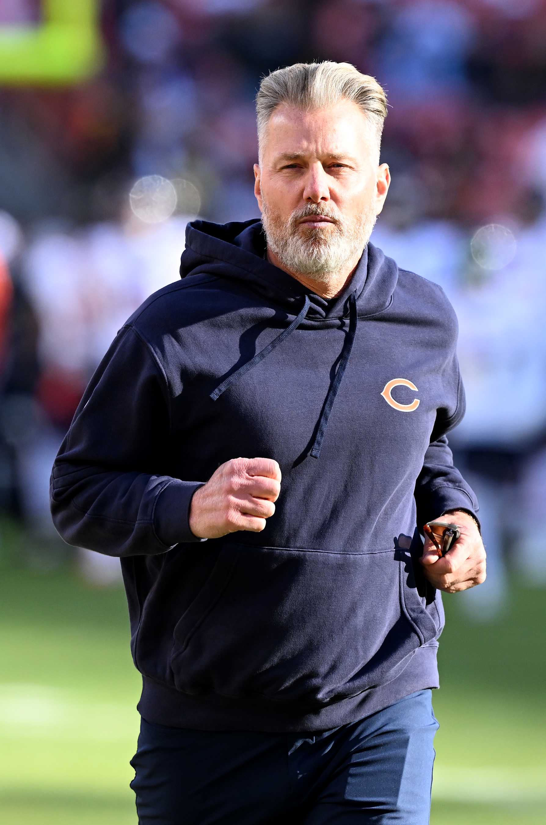 LANDOVER, MARYLAND - OCTOBER 27: Head coach Matt Eberflus of the Chicago Bears watches the teams warm up before the game against the Washington Commanders at Northwest Stadium on October 27, 2024 in Landover, Maryland. (Photo by G Fiume/Getty Images)