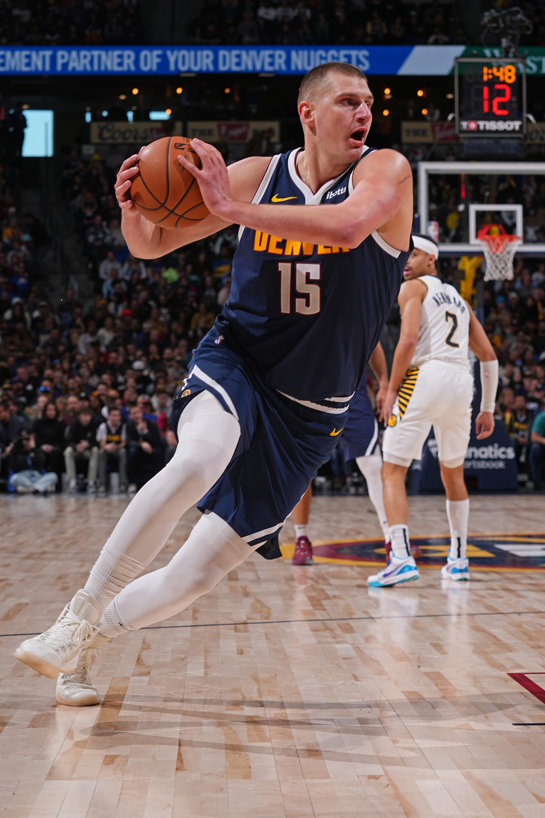 DENVER, CO - JANUARY 14: Nikola Jokic #15 of the Denver Nuggets drives to the basket during the game against the Indiana Pacers on January 14, 2024 at the Ball Arena in Denver, Colorado. NOTE TO USER: User expressly acknowledges and agrees that, by downloading and/or using this Photograph, user is consenting to the terms and conditions of the Getty Images License Agreement. Mandatory Copyright Notice: Copyright 2024 NBAE (Photo by Bart Young/NBAE via Getty Images)