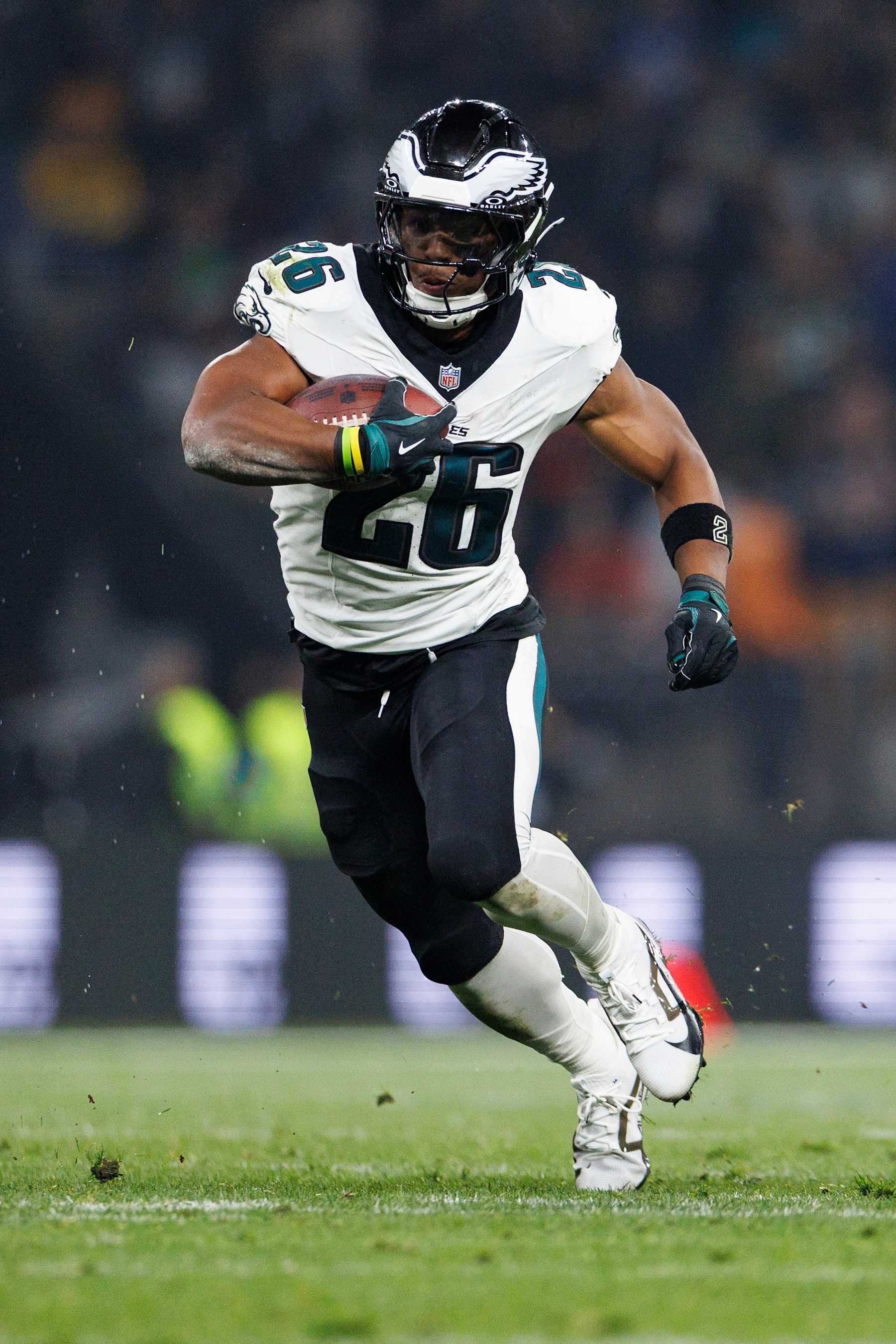 SÃO PAULO, BRAZIL - SEPTEMBER 6: Running back Saquon Barkley #26 of the Philadelphia Eagles carries the ball during the second quarter of an NFL football game against the Green Bay Packers, at Arena Corinthians on September 6, 2024 in Sao Paulo, Brazil. (Photo by Brooke Sutton/Getty Images)