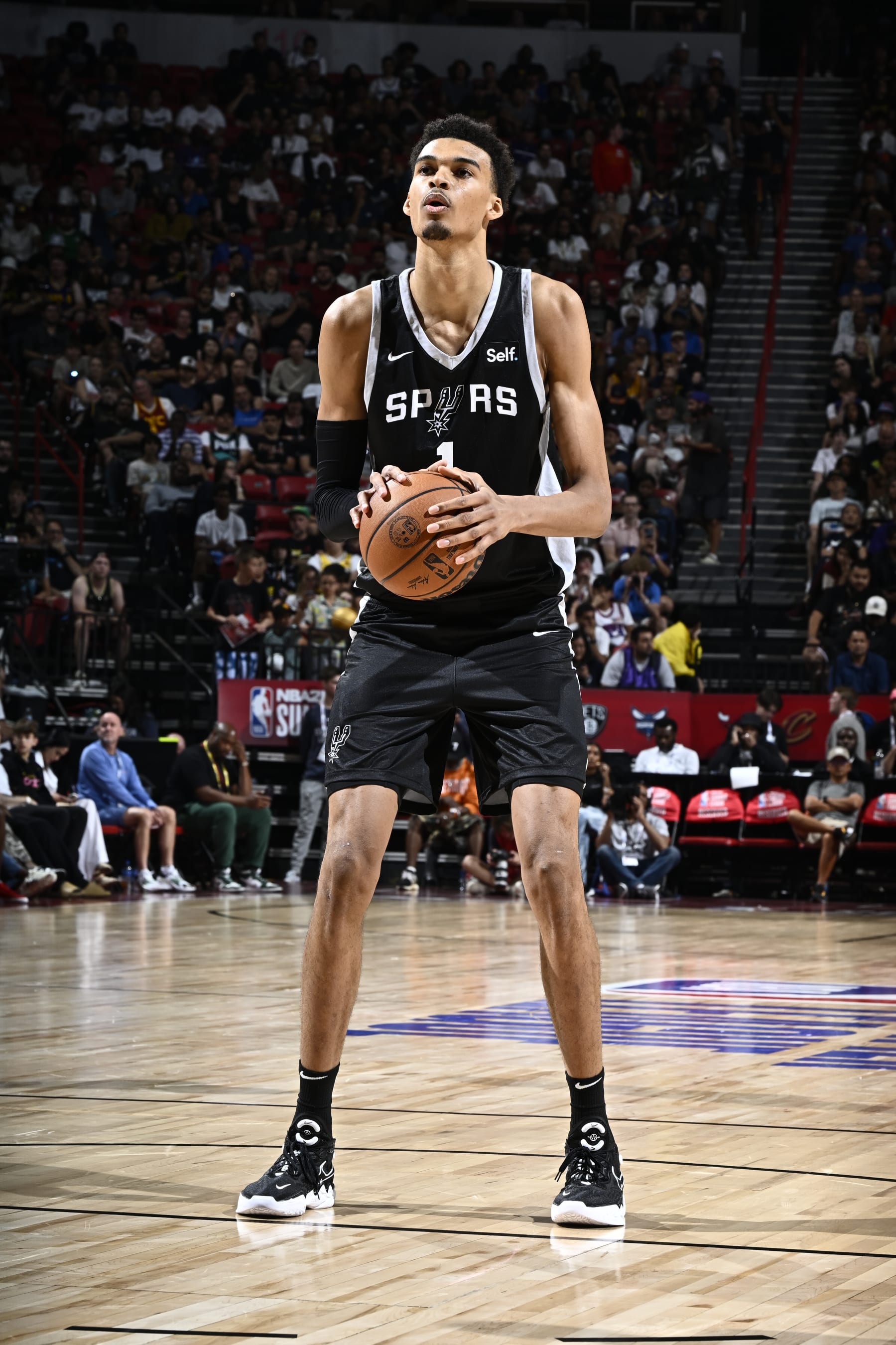 LAS VEGAS, NV - JULY 9: Victor Wembanyama #1 of the San Antonio Spurs shoots a free throw during the 2023 NBA Las Vegas Summer League on July 9, 2023 at the Thomas & Mack Center in Las Vegas, Nevada. NOTE TO USER: User expressly acknowledges and agrees that, by downloading and or using this photograph, User is consenting to the terms and conditions of the Getty Images License Agreement. Mandatory Copyright Notice: Copyright 2023 NBAE (Photo by David Dow/NBAE via Getty Images)