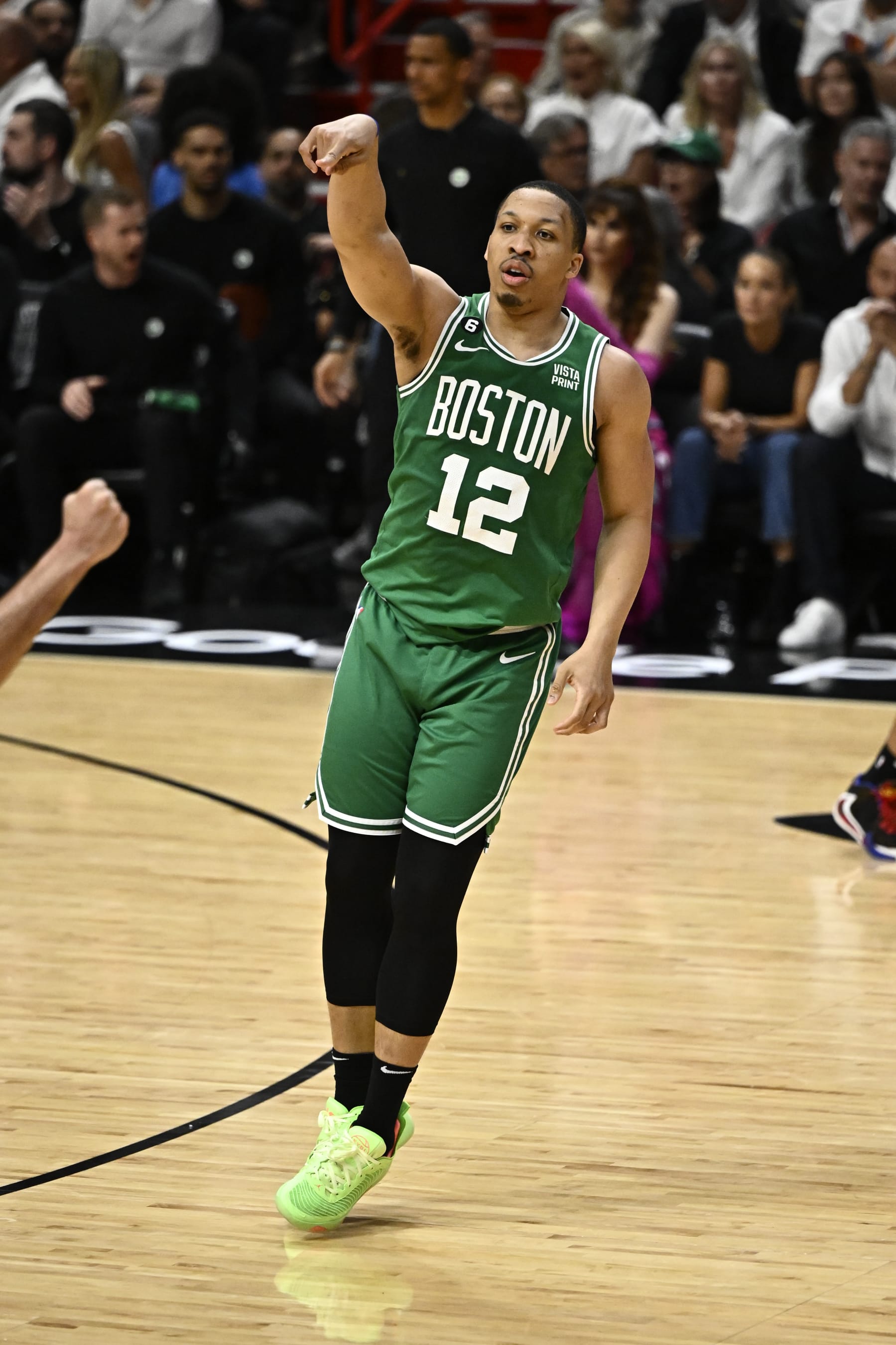 MIAMI, FL - MAY 23: Grant Williams #12 of the Boston Celtics celebrates a play during Round 3 Game 4 of the Eastern Conference Finals 2023 NBA Playoffs on May 23, 2023 at Kaseya Center in Miami, Florida. NOTE TO USER: User expressly acknowledges and agrees that, by downloading and or using this Photograph, user is consenting to the terms and conditions of the Getty Images License Agreement. Mandatory Copyright Notice: Copyright 2023 NBAE (Photo by David Dow/NBAE via Getty Images)