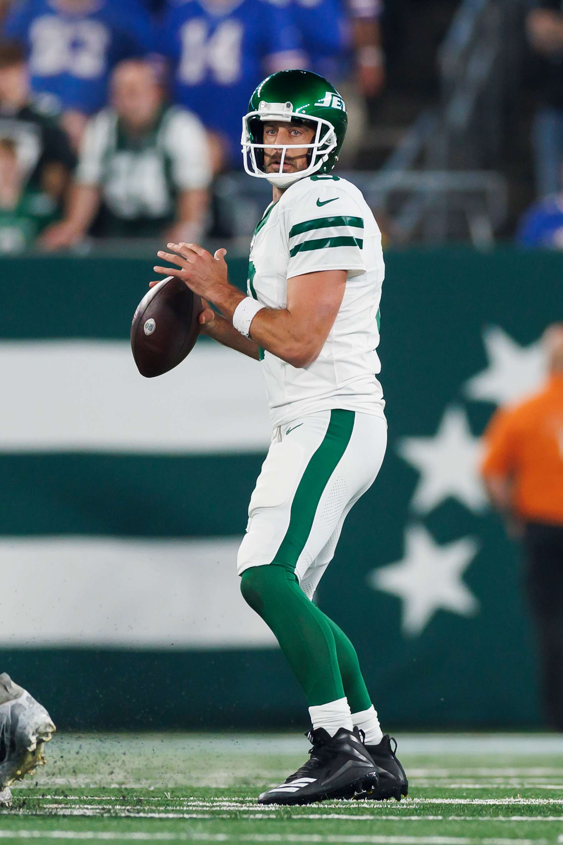 EAST RUTHERFORD, NEW JERSEY - SEPTEMBER 11: Aaron Rodgers #8 of the New York Jets drops back and looks to throw a pass during an NFL football game against the Buffalo Bills at MetLife Stadium on September 11, 2023 in East Rutherford, New Jersey. (Photo by Ryan Kang/Getty Images)