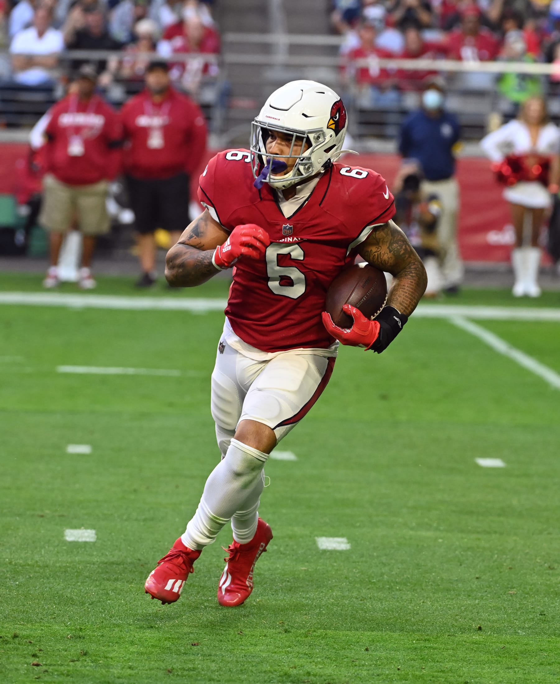 GLENDALE, ARIZONA - JANUARY 09: James Connor #6 of the Arizona Cardinals runs with the ball against the Seattle Seahawks at State Farm Stadium on January 09, 2022 in Glendale, Arizona. (Photo by Norm Hall/Getty Images)