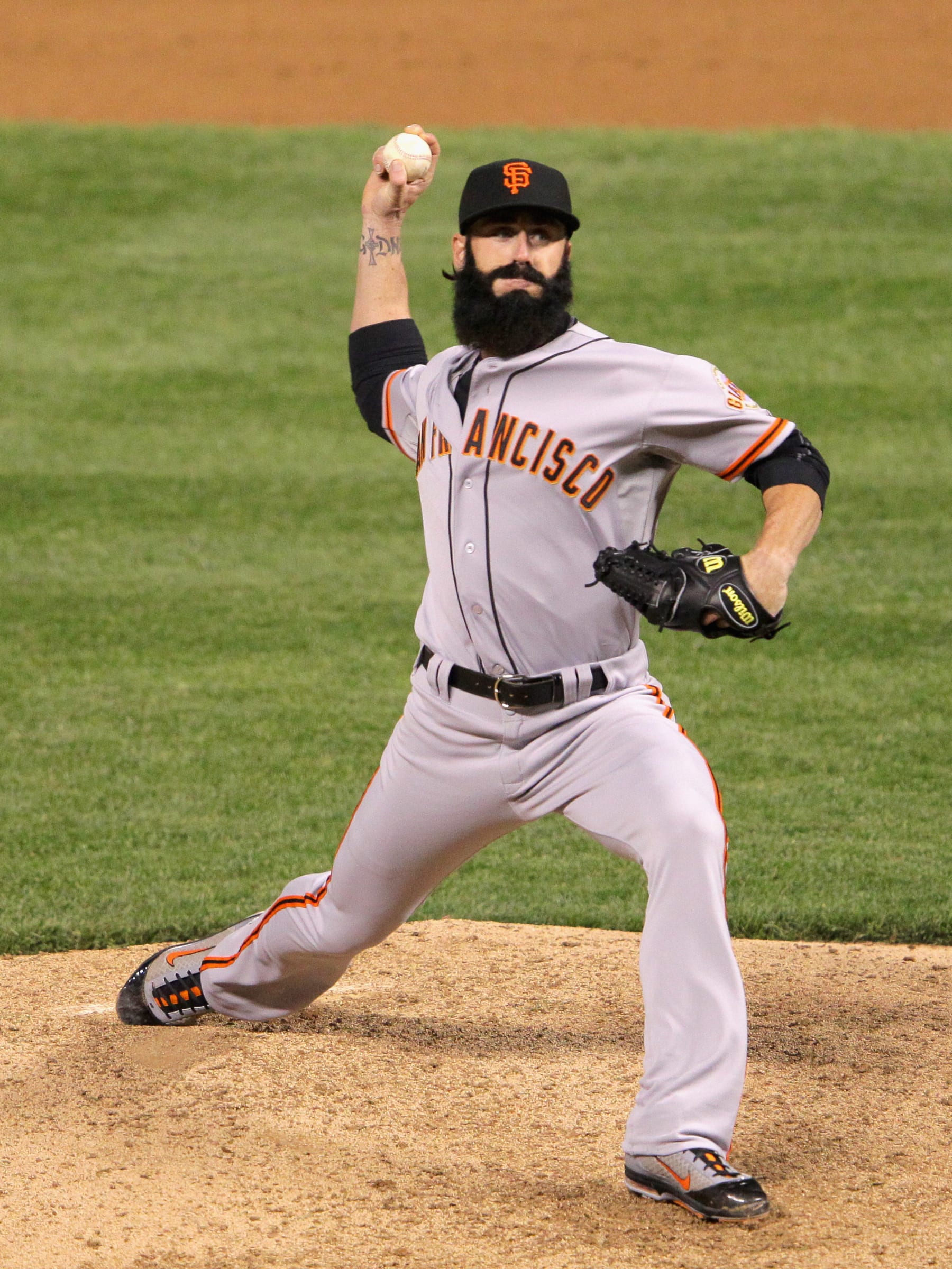 DENVER, CO - APRIL 11:  Brian Wilson #38 of the San Francisco Giants pitches in relief against the Colorado Rockies at Coors Field on April 11, 2012 in Denver, Colorado. The Rockies defeated the Giants 17-8.  (Photo by Doug Pensinger/Getty Images) 