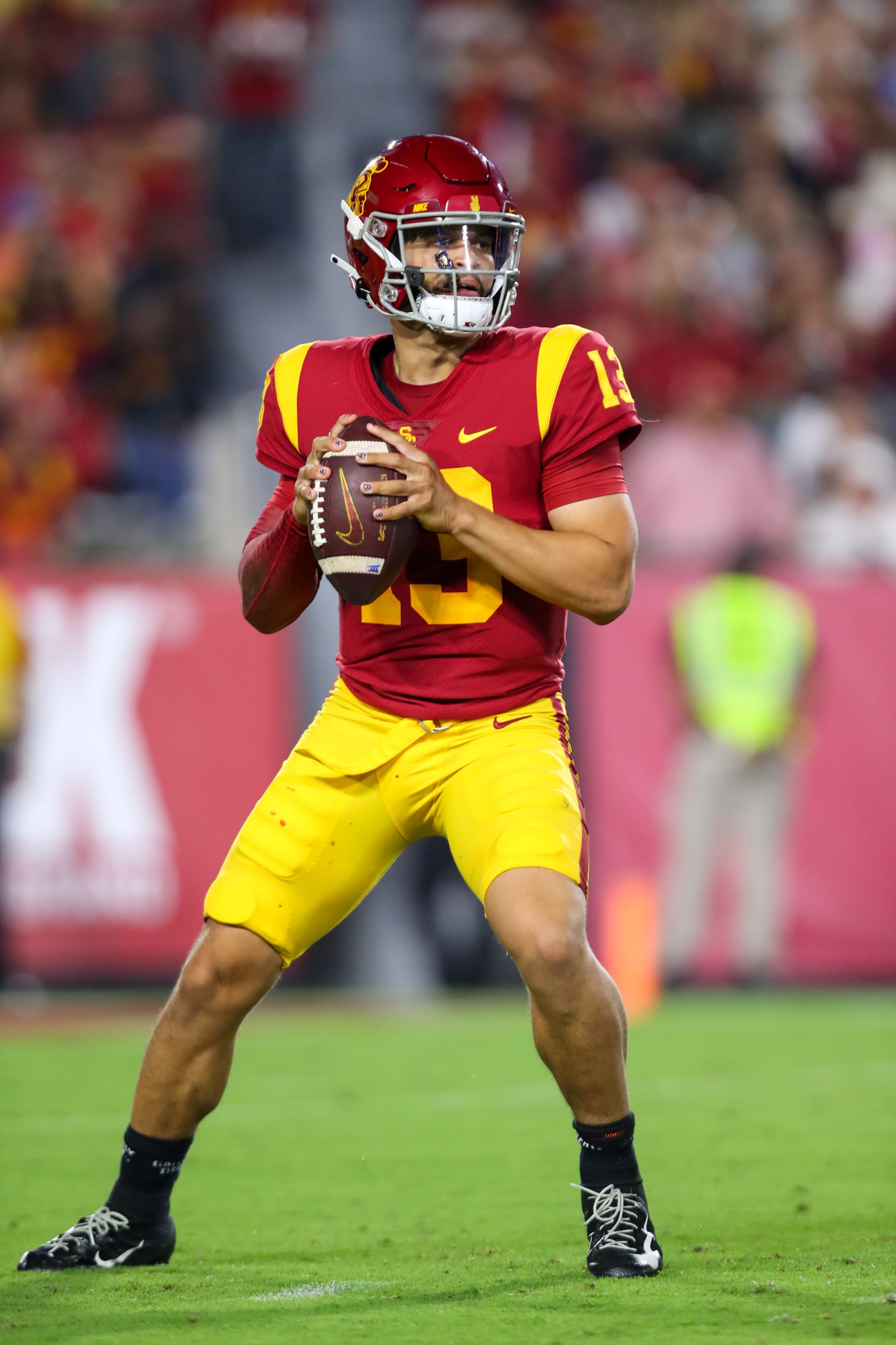 LOS ANGELES, CA - OCTOBER 08: USC Trojans quarterback Caleb Williams (13) looks to throw the ball during a college football game between the Washington State Cougars against the USC Trojans on October 08, 2022, at United Airlines Field at The Los Angeles Memorial Coliseum in Los Angeles, CA. (Photo by Jordon Kelly/Icon Sportswire via Getty Images)