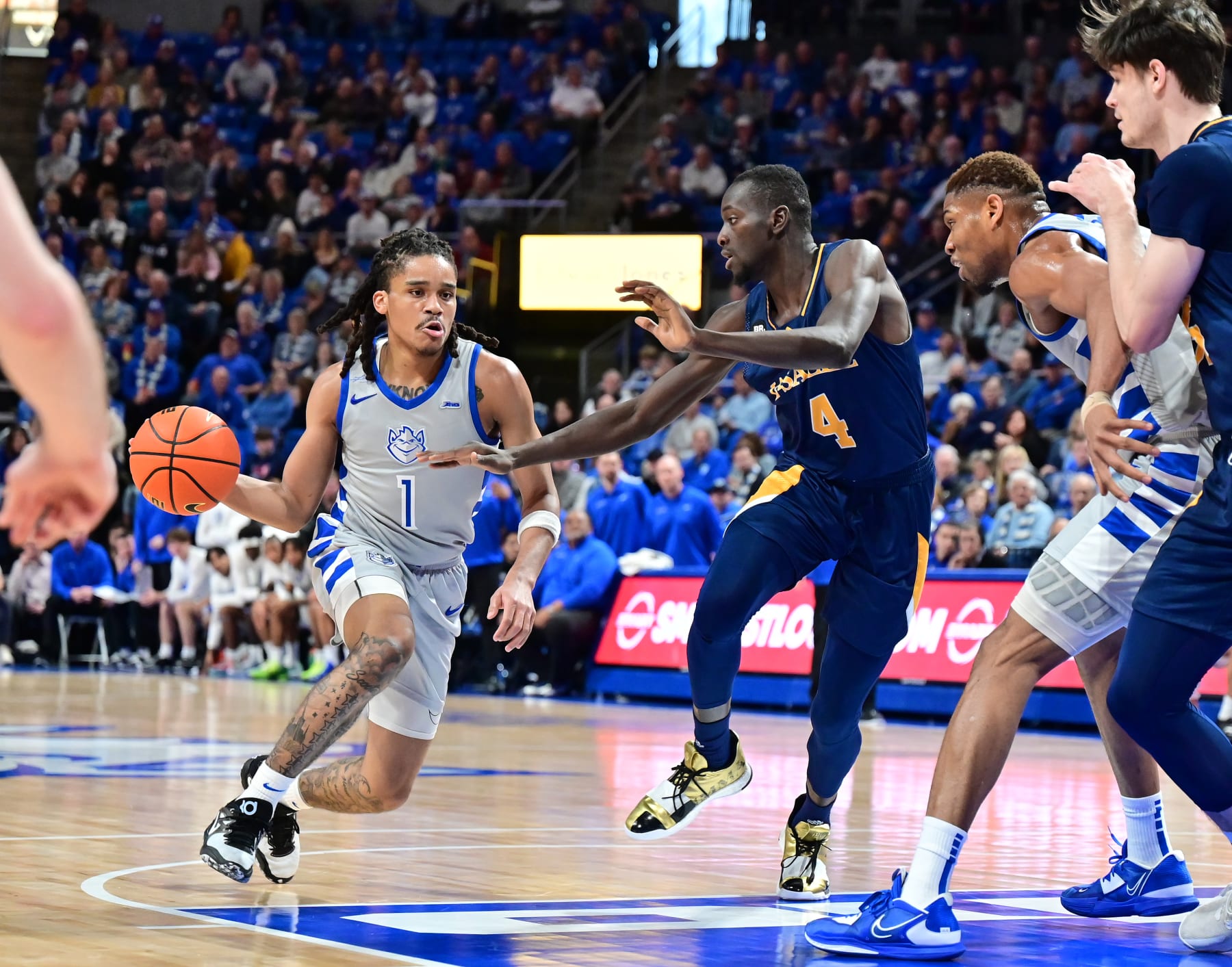 ST. LOUIS, MO - JANUARY 21: Saint Louis University guard Yuri Collins (1) drives downcourt with the ball during a college basketball game between the LaSalle Explorers and the Saint Louis Billikens on January 21, 2023, at Chaifetz Arena in St. Louis, MO (Photo by Keith Gillett/Icon Sportswire via Getty Images)