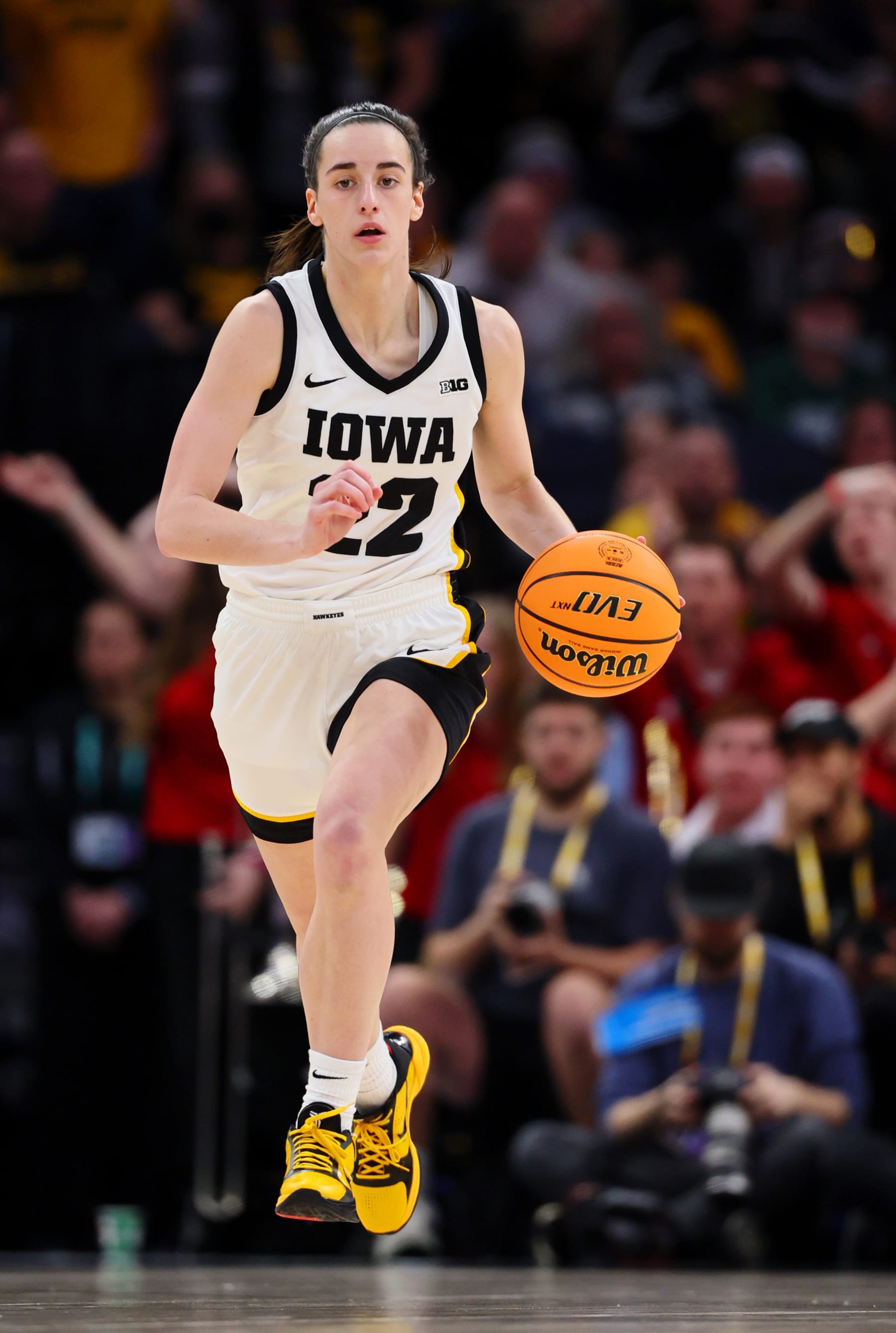 MINNEAPOLIS, MINNESOTA - MARCH 10: Caitlin Clark #22 of the Iowa Hawkeyes dribbles against the Nebraska Cornhuskers in the second half during the Big Ten Women's Basketball Tournament Championship at Target Center on March 10, 2024 in Minneapolis, Minnesota. (Photo by Adam Bettcher/Getty Images)