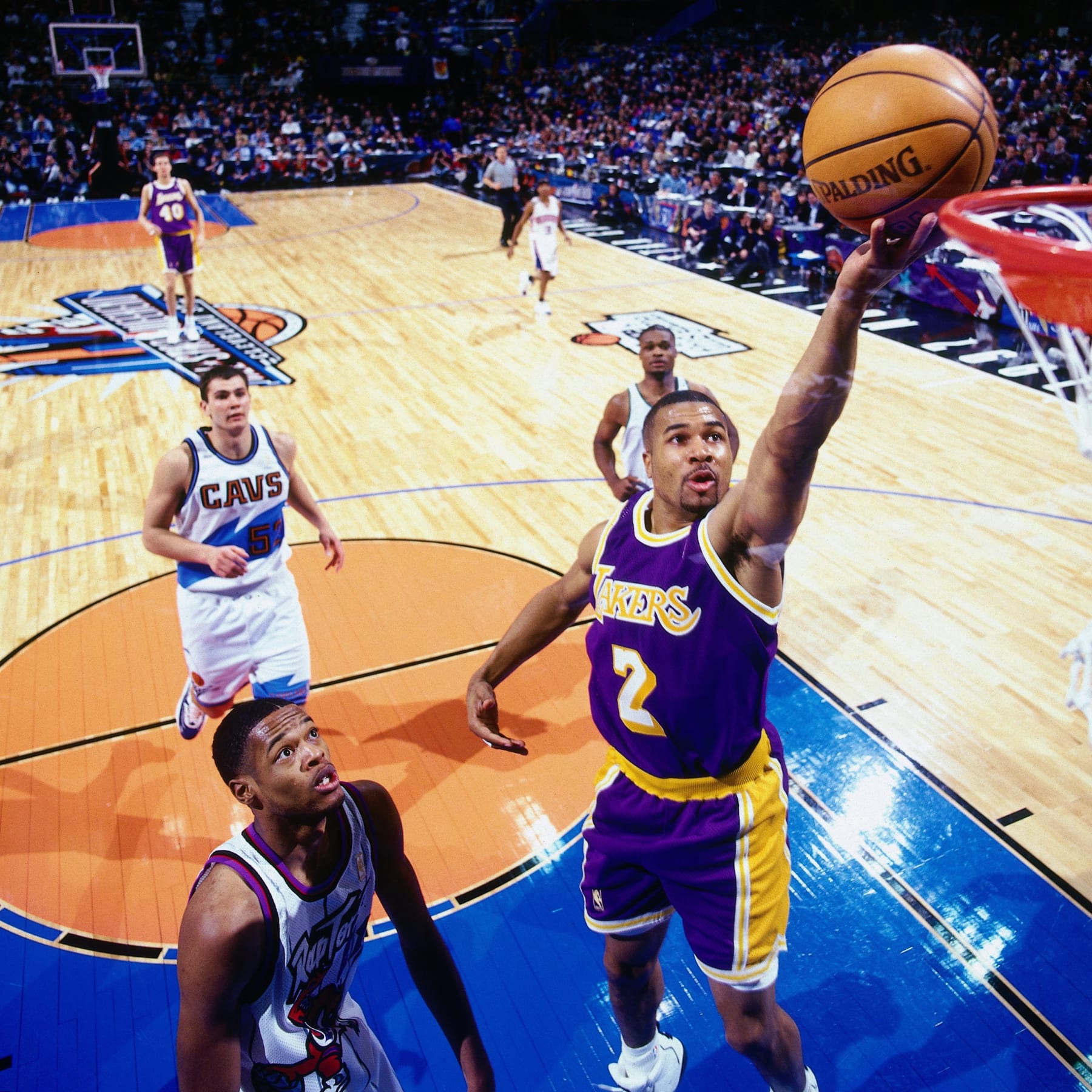 CLEVELAND, OH - FEBRUARY 8:  Derek Fisher #2 of the Western Conference attempts a layup against the Eastern Conference during the 1997 Rookie All-Star game played February 8, 1997 at the Gund Arena in Cleveland, Ohio.  NOTE TO USER: User expressly acknowledges that, by downloading and or using this photograph, User is consenting to the terms and conditions of the Getty Images License agreement. Mandatory Copyright Notice: Copyright 1997 NBAE (Photo by Nathaniel S. Butler/NBAE via Getty Images)