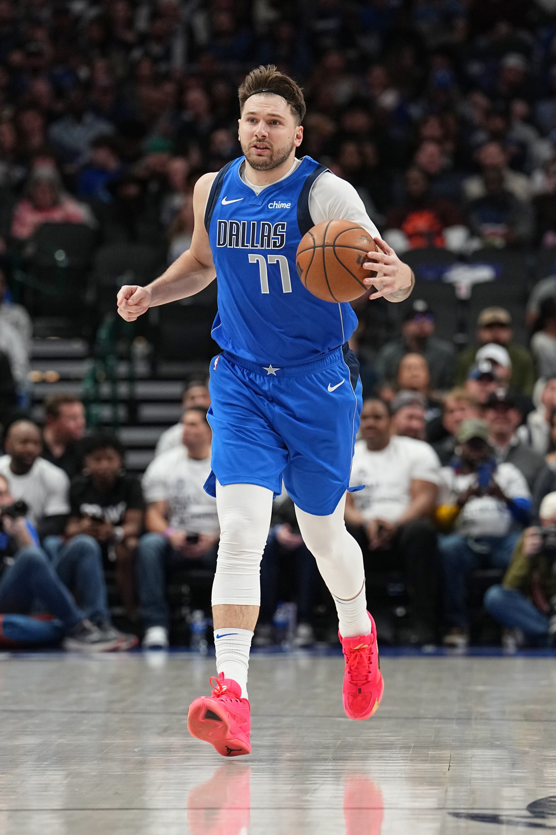 DALLAS, TX - JANUARY 29: Luka Doncic #77 of the Dallas Mavericks handles the ball during the game  on January 29, 2024 at the American Airlines Center in Dallas, Texas. NOTE TO USER: User expressly acknowledges and agrees that, by downloading and or using this photograph, User is consenting to the terms and conditions of the Getty Images License Agreement. Mandatory Copyright Notice: Copyright 2024 NBAE (Photo by Glenn James/NBAE via Getty Images)