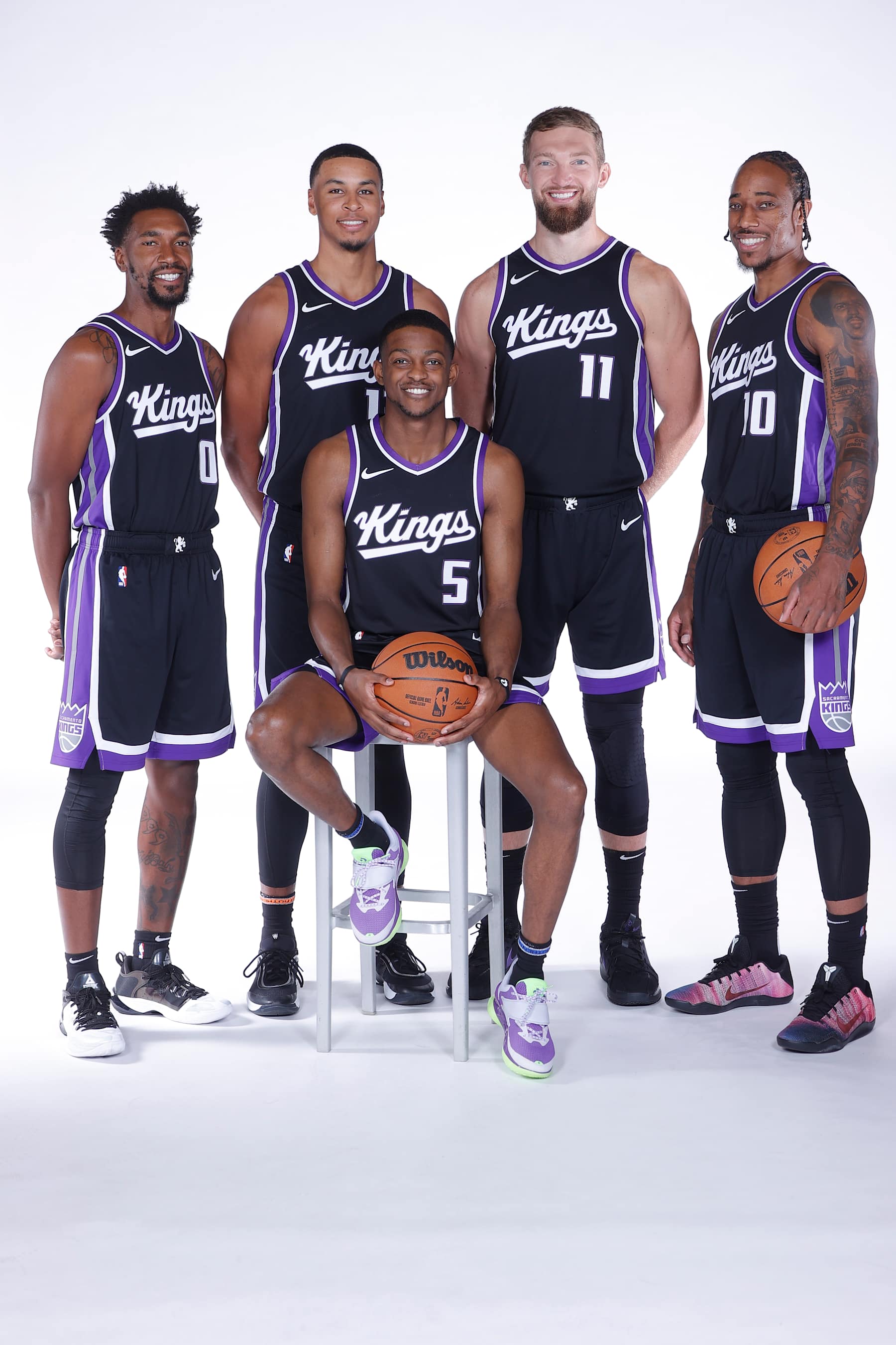 SACRAMENTO, CA - SEPTEMBER 30: Malik Monk #0, Keegan Murray #13, De'Aaron Fox #5, Domantas Sabonis #11 and DeMar DeRozan #10 of the Sacramento Kings poses for a portrait during NBA Media Day on September 30, 2024 at the Golden 1 Center in Sacramento, California. NOTE TO USER: User expressly acknowledges and agrees that, by downloading and/or using this Photograph, user is consenting to the terms and conditions of the Getty Images License Agreement. Mandatory Copyright Notice: Copyright 2024 NBAE (Photo by Rocky Widner/NBAE via Getty Images)