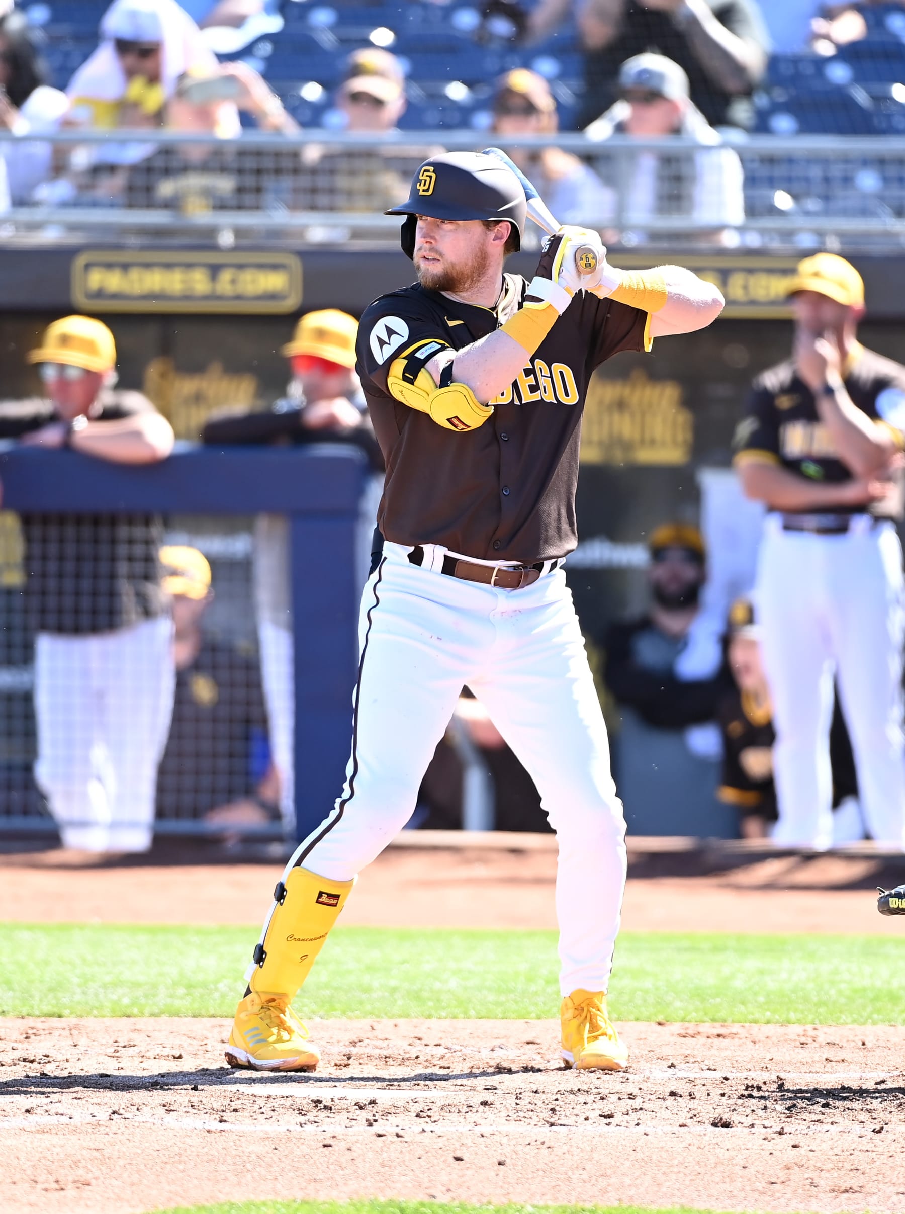 PEORIA, ARIZONA - FEBRUARY 22: Jake Cronenworth #9 of the San Diego Padres gets ready in the batters box against the Los Angeles Dodgers during a spring training game at the Peoria Sports Complex on February 22, 2024 in Peoria, Arizona. (Photo by Norm Hall/Getty Images)
