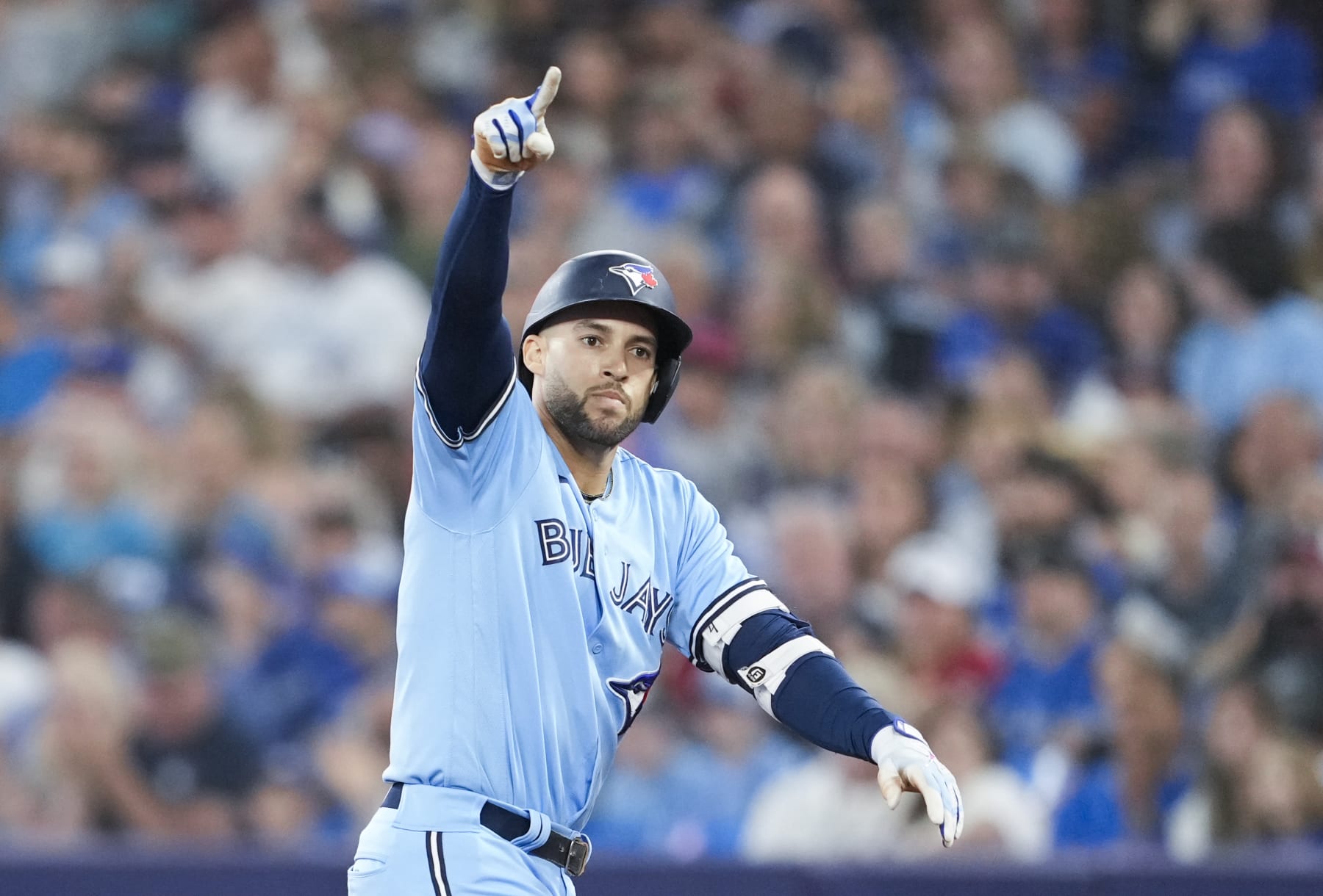 TORONTO, ON - JUNE 11: George Springer #4 of Toronto Blue Jays celebrates a single against the Minnesota Twins during the first inning in their MLB game at the Rogers Centre on June 11, 2023 in Toronto, Ontario, Canada. (Photo by Mark Blinch/Getty Images)