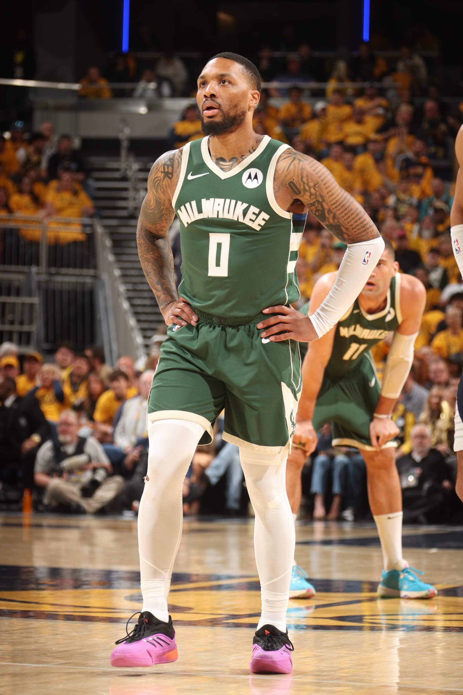 INDIANAPOLIS, IN - APRIL 26: Damian Lillard #0 of the Milwaukee Bucks looks on during the game against the Indiana Pacers during Round 1 Game 3 of the 2024 NBA Playoffs on April 26, 2024 at Gainbridge Fieldhouse in Indianapolis, Indiana. NOTE TO USER: User expressly acknowledges and agrees that, by downloading and or using this Photograph, user is consenting to the terms and conditions of the Getty Images License Agreement. Mandatory Copyright Notice: Copyright 2023 NBAE (Photo by Nathaniel S. Butler/NBAE via Getty Images)