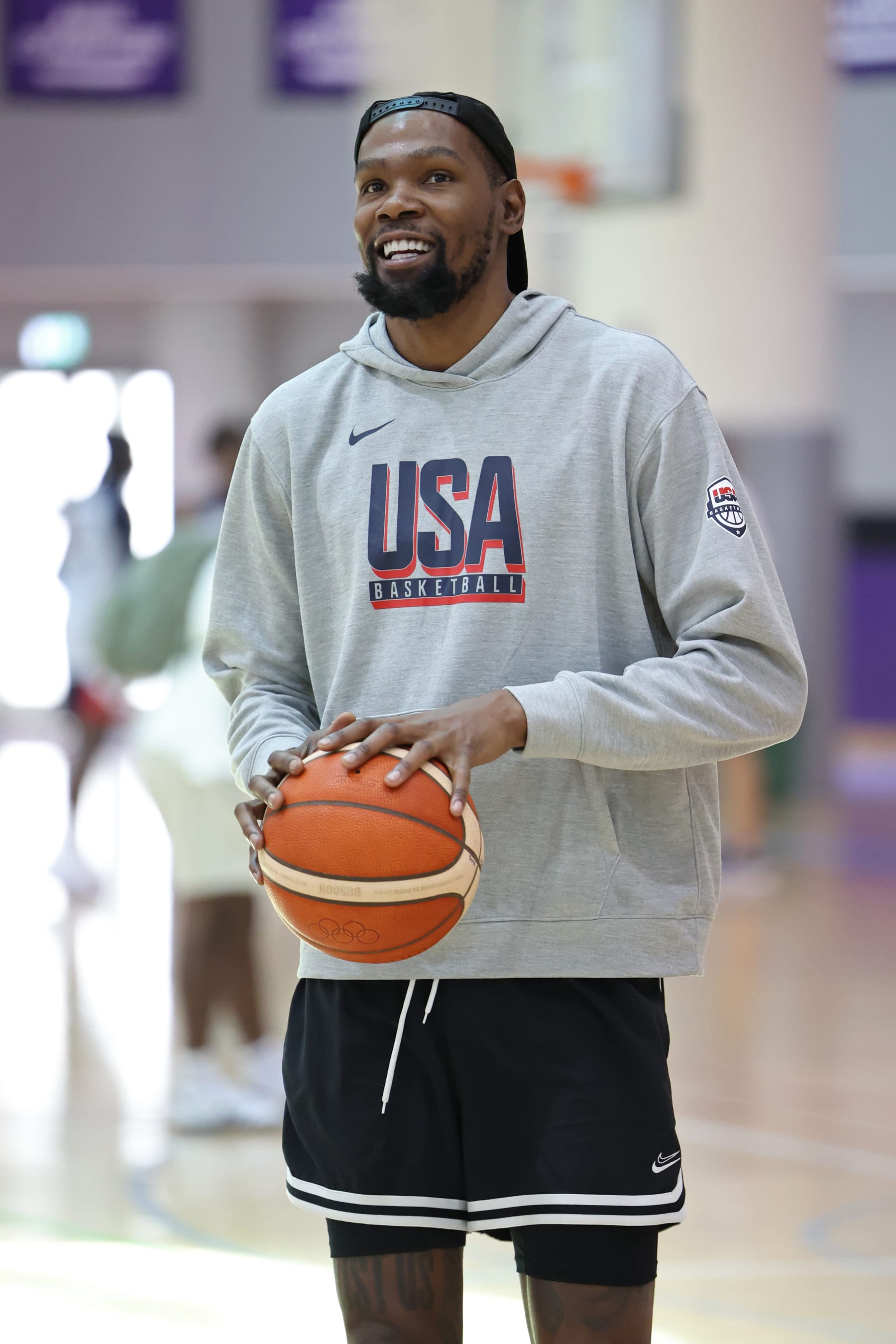 ABU DHABI, UAE - JULY 14: Kevin Durant of the Men's National Team smiles during practice on July 14, 2024 in Abu Dhabi, The United Arab Emirates at tNYU Abu Dhabi. NOTE TO USER: User expressly acknowledges and agrees that, by downloading and/or using this Photograph, user is consenting to the terms and conditions of the Getty Images License Agreement. Mandatory Copyright Notice: Copyright 2024 NBAE (Photo by Joe Murphy/NBAE via Getty Images)