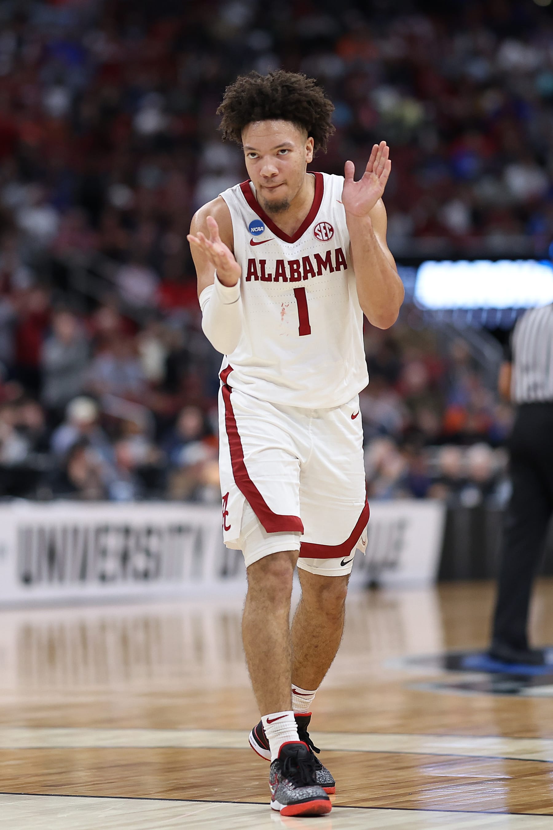 LOUISVILLE, KENTUCKY - MARCH 24: Mark Sears #1 of the Alabama Crimson Tide reacts during the second half in the Sweet 16 round of the NCAA Men's Basketball Tournament at KFC YUM! Center against the San Diego State Aztecs on March 24, 2023 in Louisville, Kentucky. (Photo by Rob Carr/Getty Images)